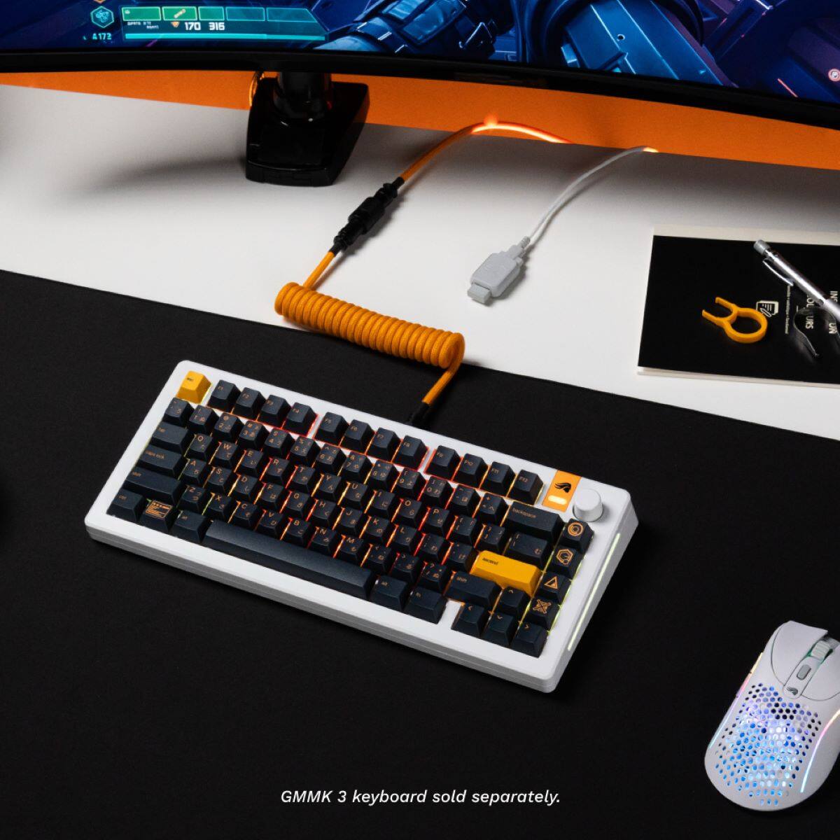 The text on the image reads: "GMMK 3 keyboard sold separately."
