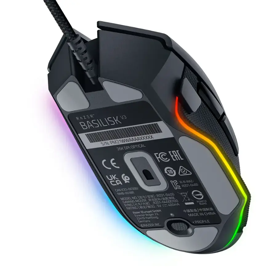 The Basilisk V3 gaming mouse has a unique design, featuring a rainbow light on the bottom. The mouse is equipped with an optical sensor and has a DPI of 26,000. The product is made in China and is rated for use in the UK, Canada, and the United States. The model number for this mouse is RZ01-04000100, and it is compatible with both Windows and Mac operating systems.