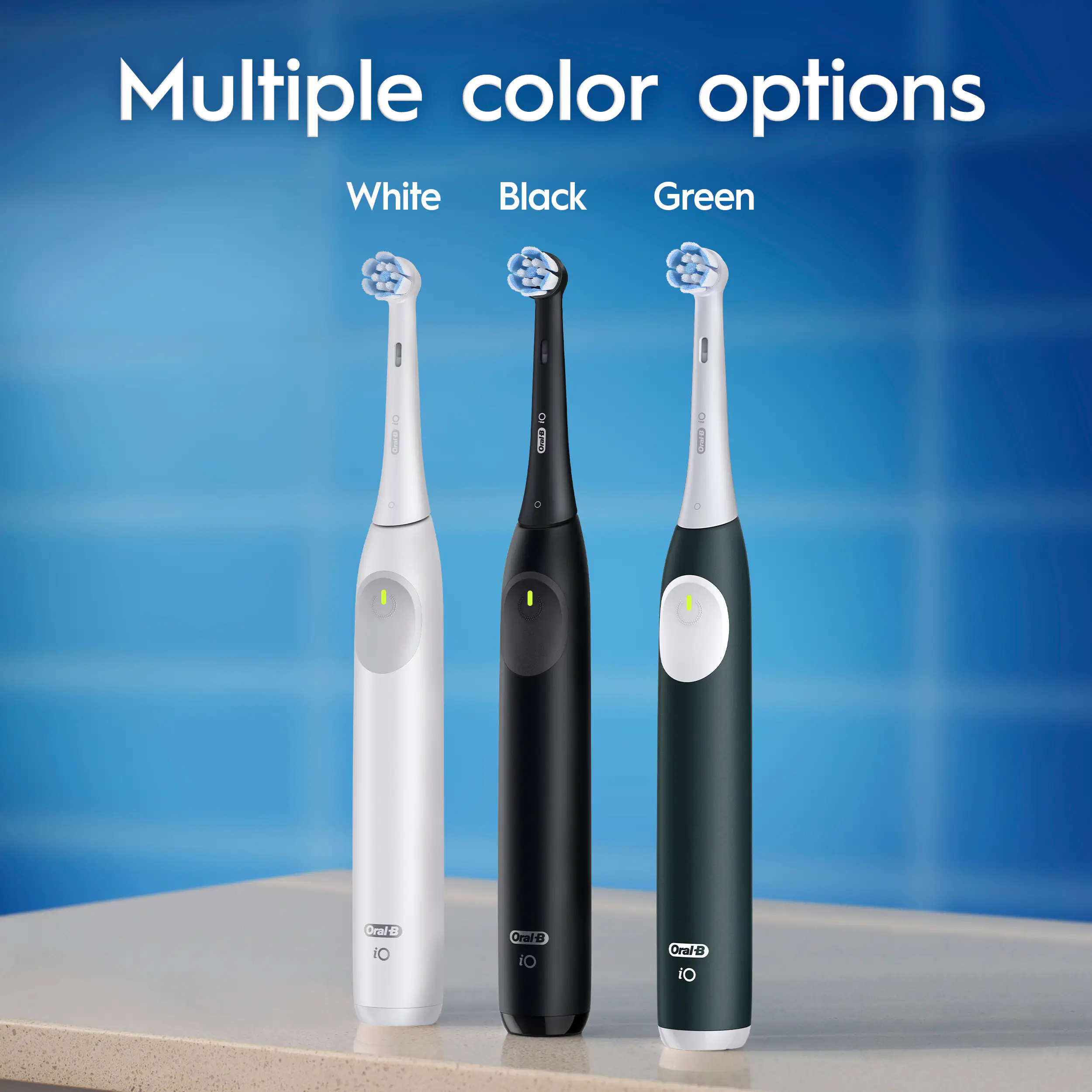 Multiple color options are available for toothbrushes, including White, Black, Green, and Oraie. The toothbrushes are displayed in a row, with one toothbrush being white, another black, and the third one green. The toothbrushes are made by Oral-B and Oraie.