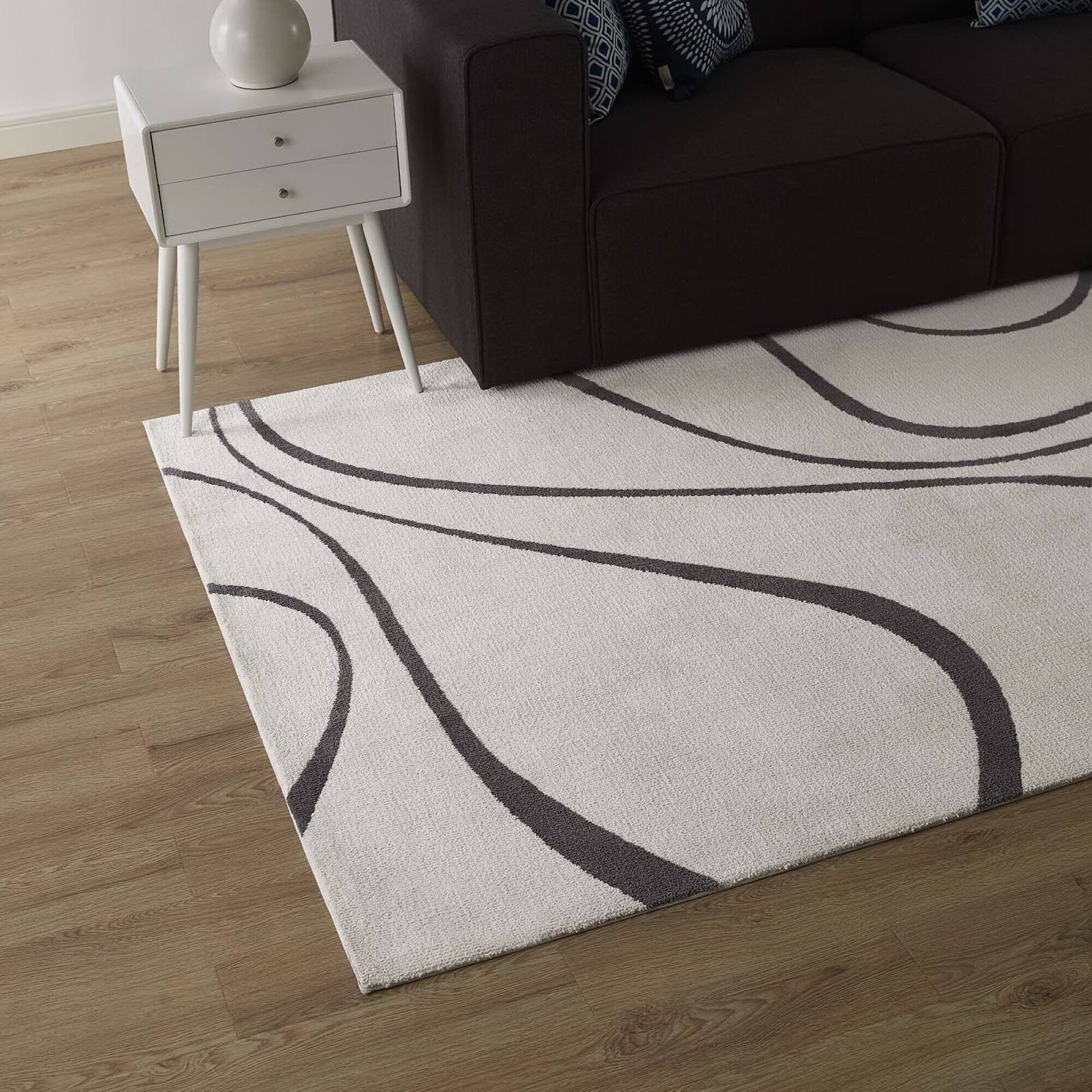 Left. Modway - Therese Abstract Swirl Area Rug - Ivory and Charcoal.