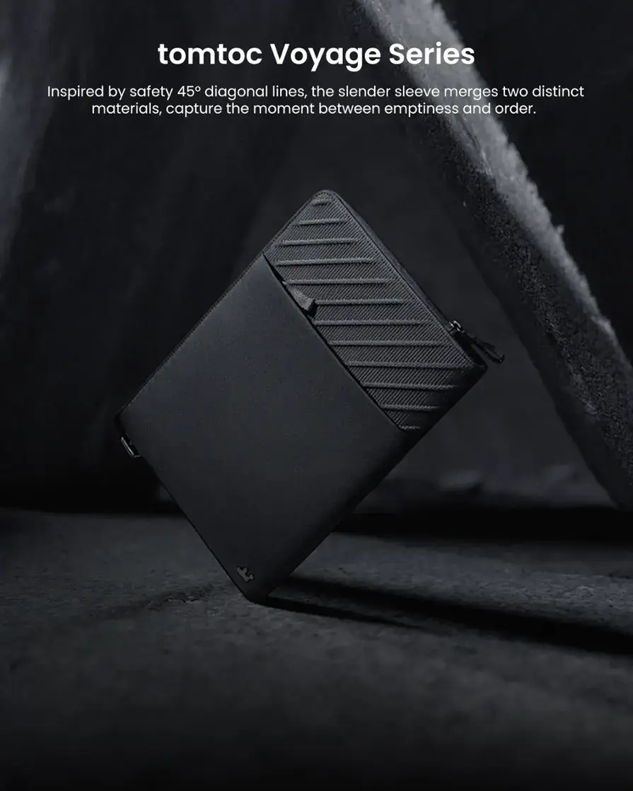 Tomtoc Voyage Series: Inspired by safety 45 diagonal lines, the slender sleeve merges two distinct materials, capturing the moment between emptiness and order.