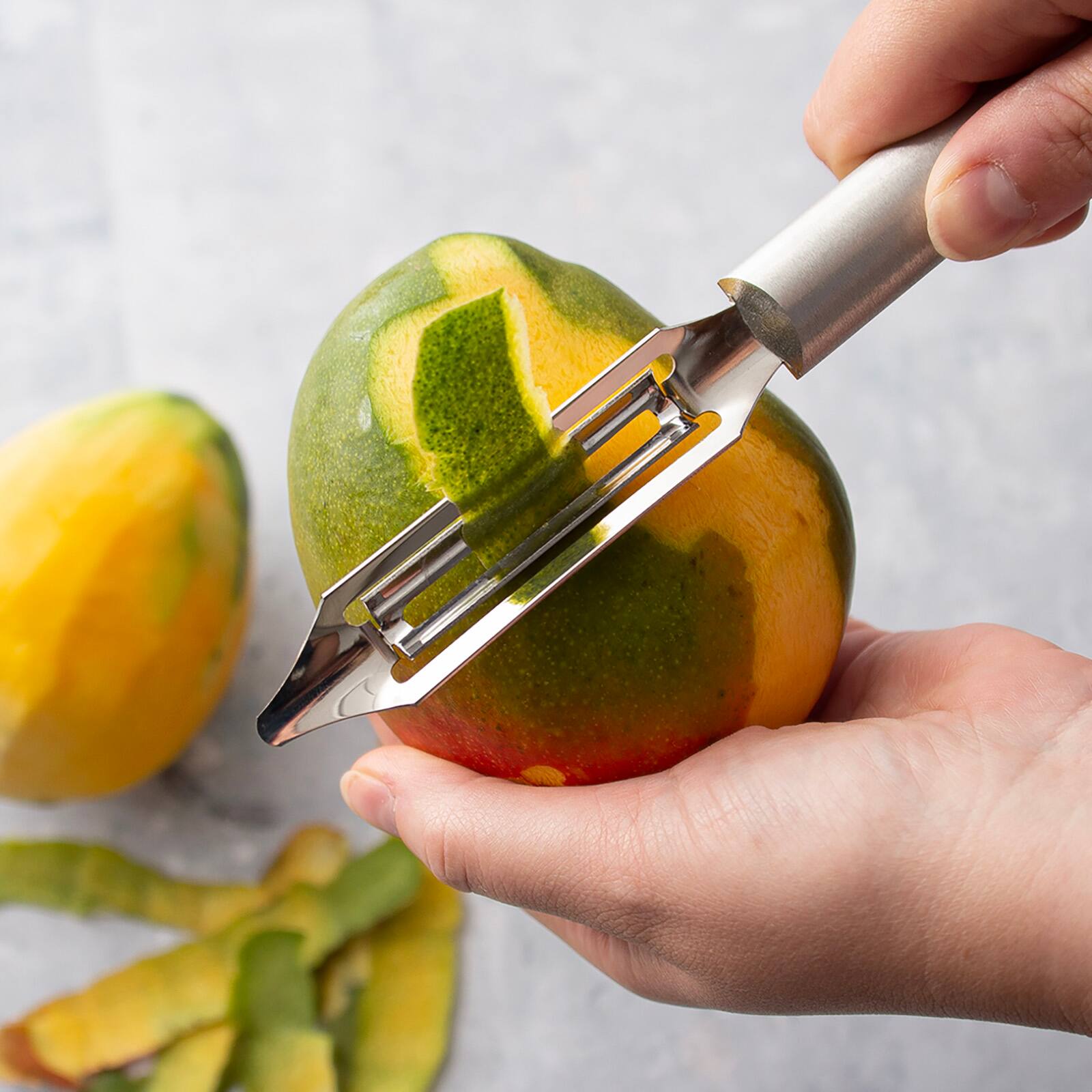 Alt View 5. Rada - Cutlery 2-Inch Deluxe Vegetable Peeler with Straight Blade, Aluminum Handle - Silver.