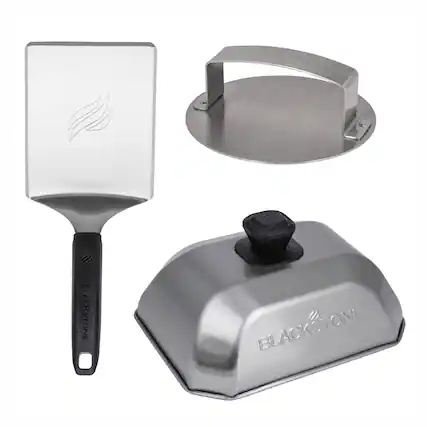 The image features a variety of Blackstone cooking tools, including a spatula, a griddle, and a grill. The spatula is made of stainless steel and has a black handle. The griddle is also made of stainless steel and has a black handle. The grill is also made of stainless steel and has a black handle. These tools are designed for use with the Blackstone portable grill, providing a convenient and efficient way to cook food outdoors.