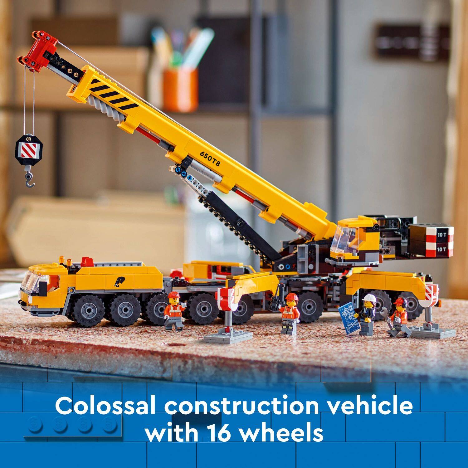 Colossal construction vehicle with 16 wheels.
