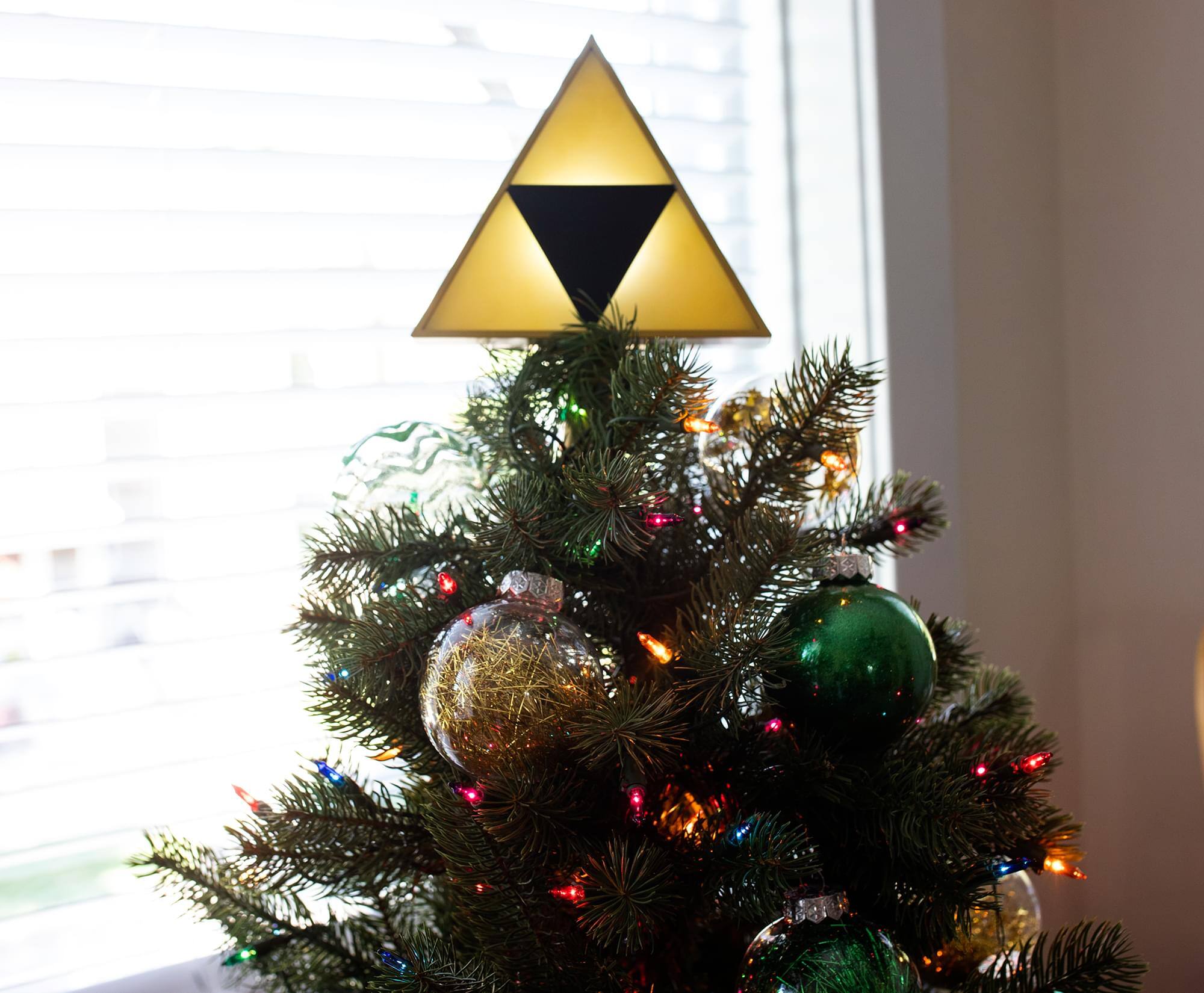Alt View 3. Halo - The Legend of Zelda 7-Inch Triforce Light-Up Holiday Tree Topper Decoration - Yellow.