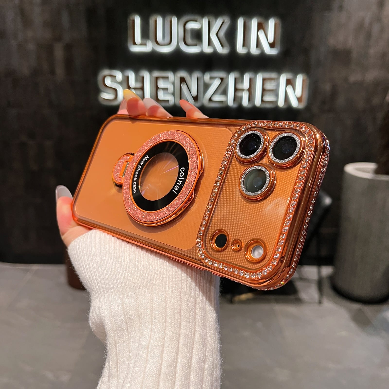 UUCOVER - Glitter Case for Apple iPhone 17 Pro Max with Rotating Metal Ring kickstand, Lens Protection Shockproof Slim Clear Cover - Orange price history on PriceWatchPro