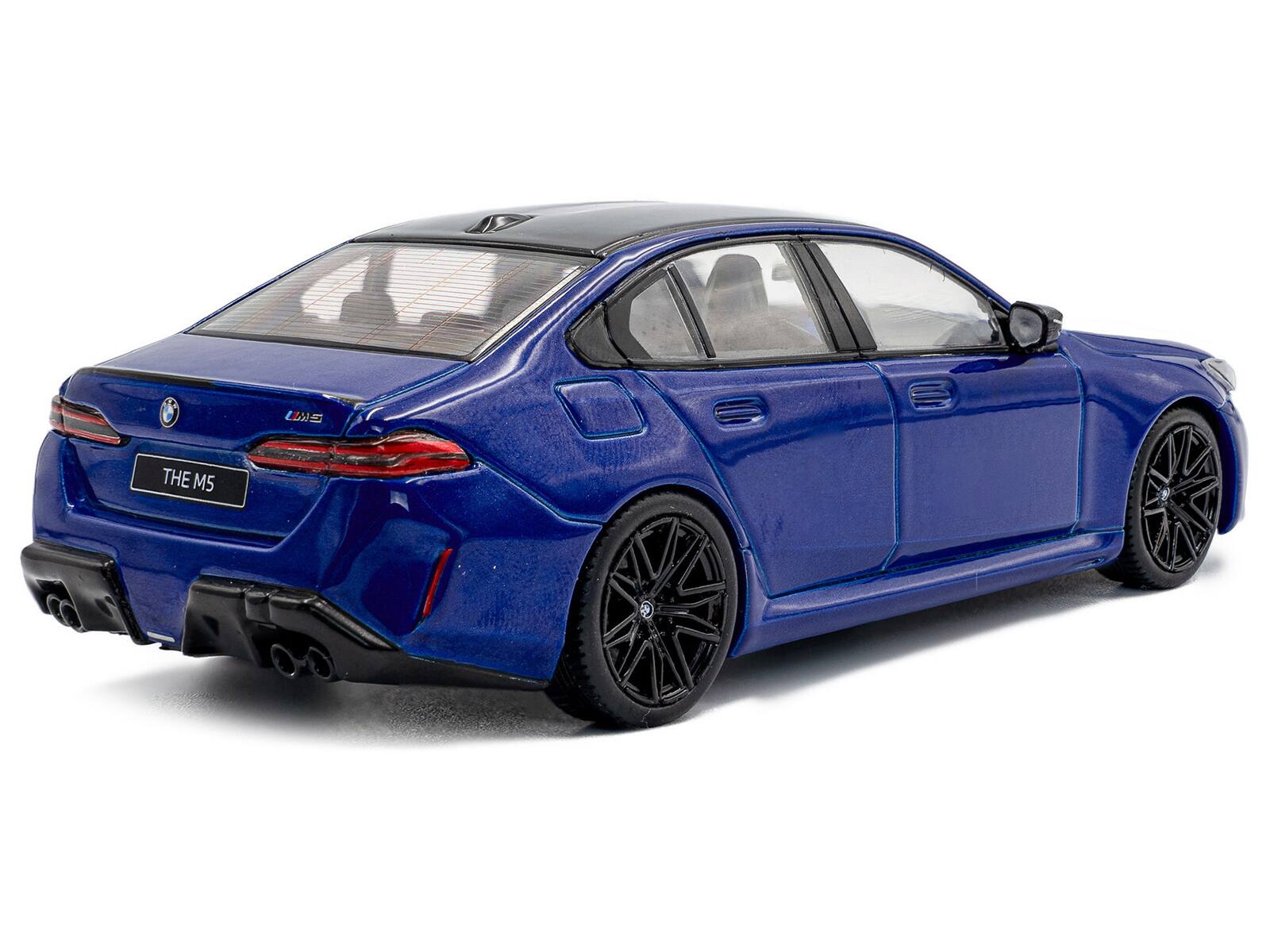 Alt View 2. Solido - 2024 BMW M5 Sedan Marina Bay Blue Metallic with Black Top 1/43 Diecast Model Car by Solido.