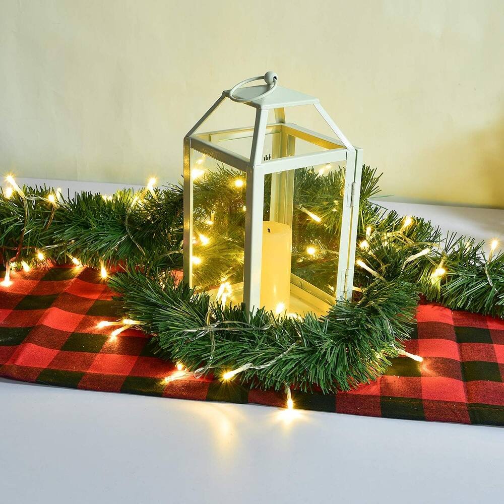 Left. PARKER SLATER - 16.5FT Christmas Garland with 50 LED Lights, Green Artificial Holiday Decor - Dark and Light Green.