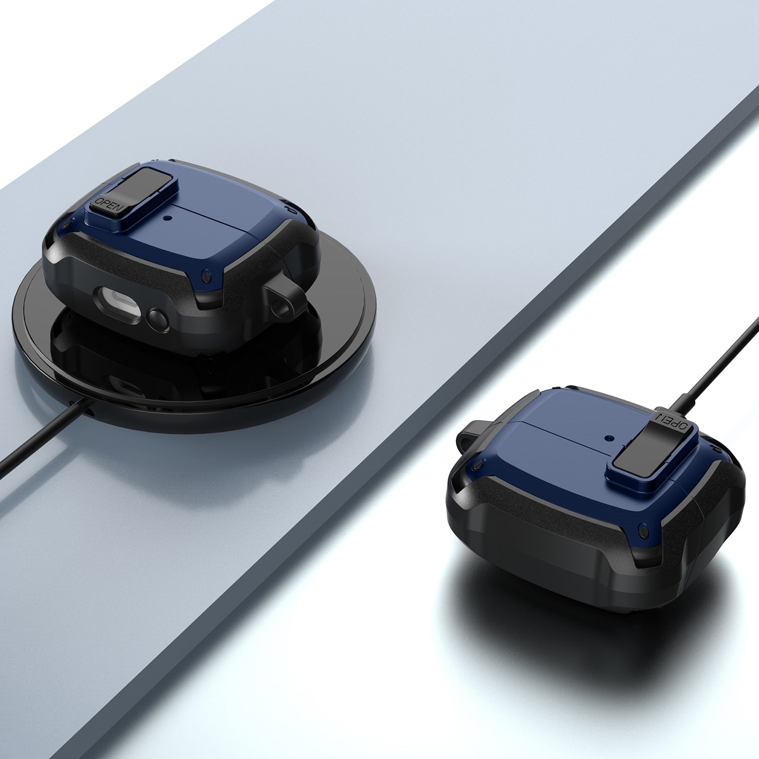 The image shows two black electronic devices, possibly cell phones, sitting on a flat surface. The devices are placed on a charging station, with one device positioned slightly higher than the other. The charging station is connected to a wall outlet, ensuring that the devices are charged and ready for use.