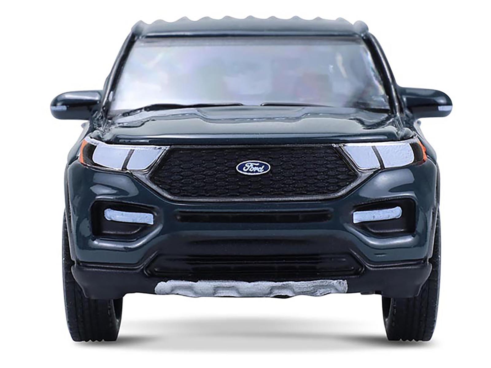 Left. Greenlight - 2024 Ford Explorer Stone Blue "Showroom Floor" Series 7 1/64 Diecast Model Car by Greenlight - Blue.