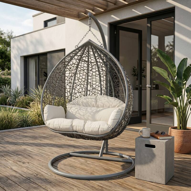 Angle. LeisureMod - Recluse Teardrop Grey Wicker Hanging Egg Chair - Modern Indoor Outdoor Swing with Stand & Quick-Dry Cushion - Arctic White.