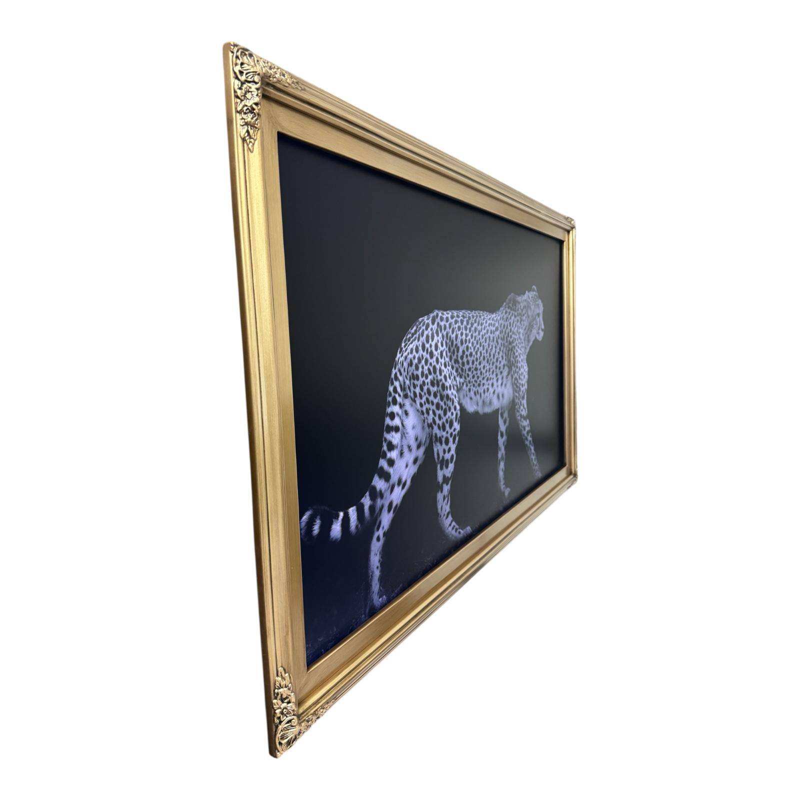 Angle. LAREDO FRAME FACTORY - 50 inch Handmade ornate Tv frame for Samsung The Frame tv and Frame Pro Model - ANTIQUE GOLD.