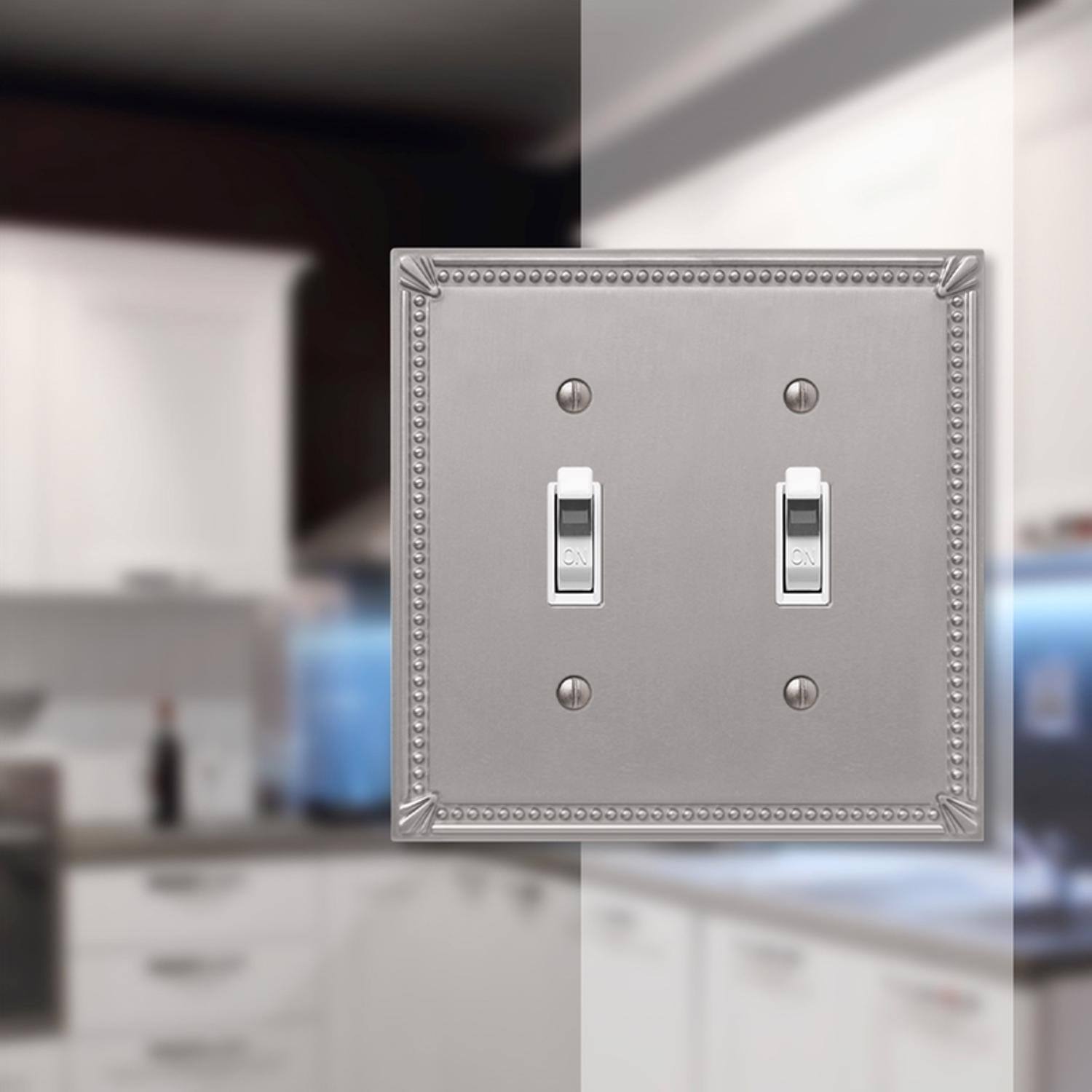 Left. AMERELLE - Amerelle Imperial Bead Brushed Nickel 2 gang Die-Cast Metal Toggle Wall Plate 1 pk - Nickel.
