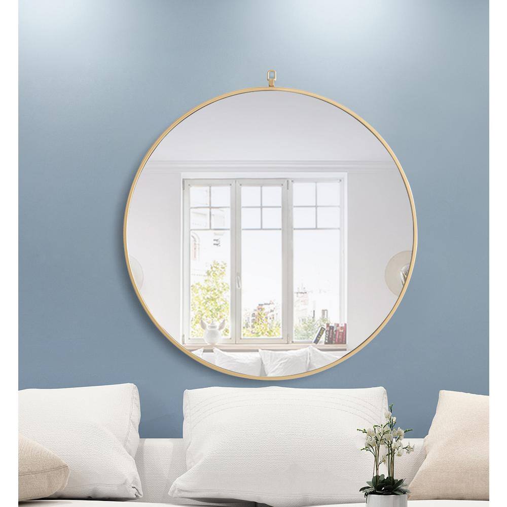 Left. Elegant Decor - Metal frame Round Mirror with decorative hook 32 inch Brass finish - Brass.