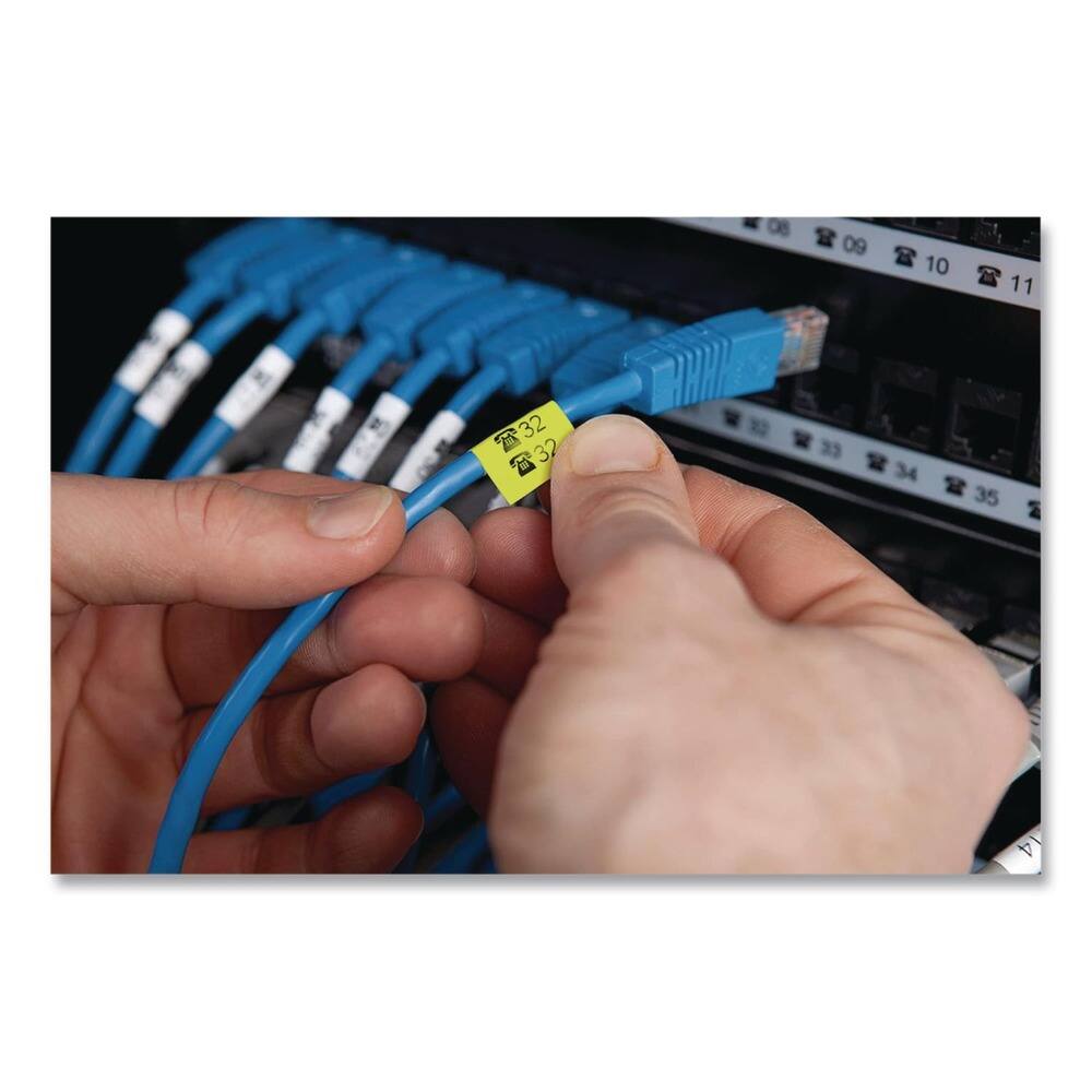 Left. DYMO - DYMO 18490 Rhino 0.5 in. x 11.5 ft. Flexible Nylon Industrial Label Tape - Yellow/Black Print (1-Roll) - Yellow.