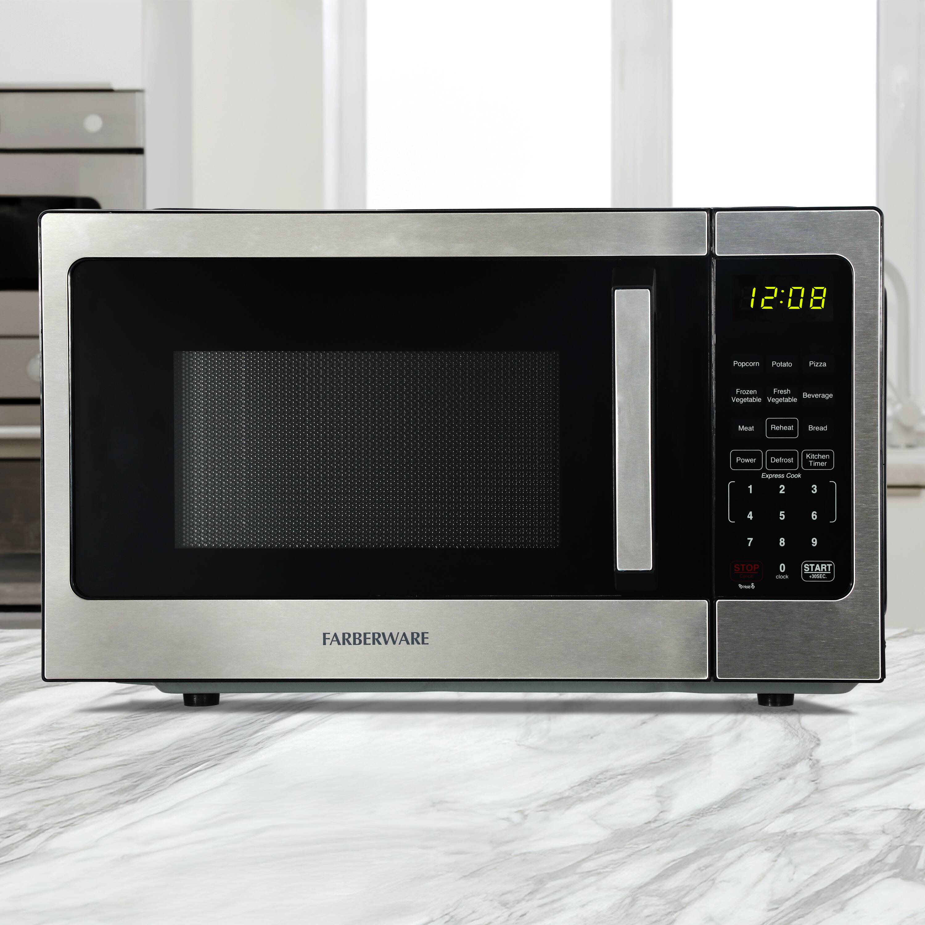 12:08 Popcorn Potato Pizza Fresh Vegetable Beverage Meat Reheat Bread Power Defrost Kitchen 1 2 3 4 5 6 7 8 9 STOP 0 - START - FARBERWARE