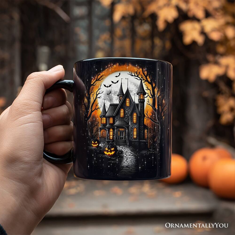 Left. OrnamentallyYou - Haunted House Night Halloween Mug, Spooky Horror Gift - Black.