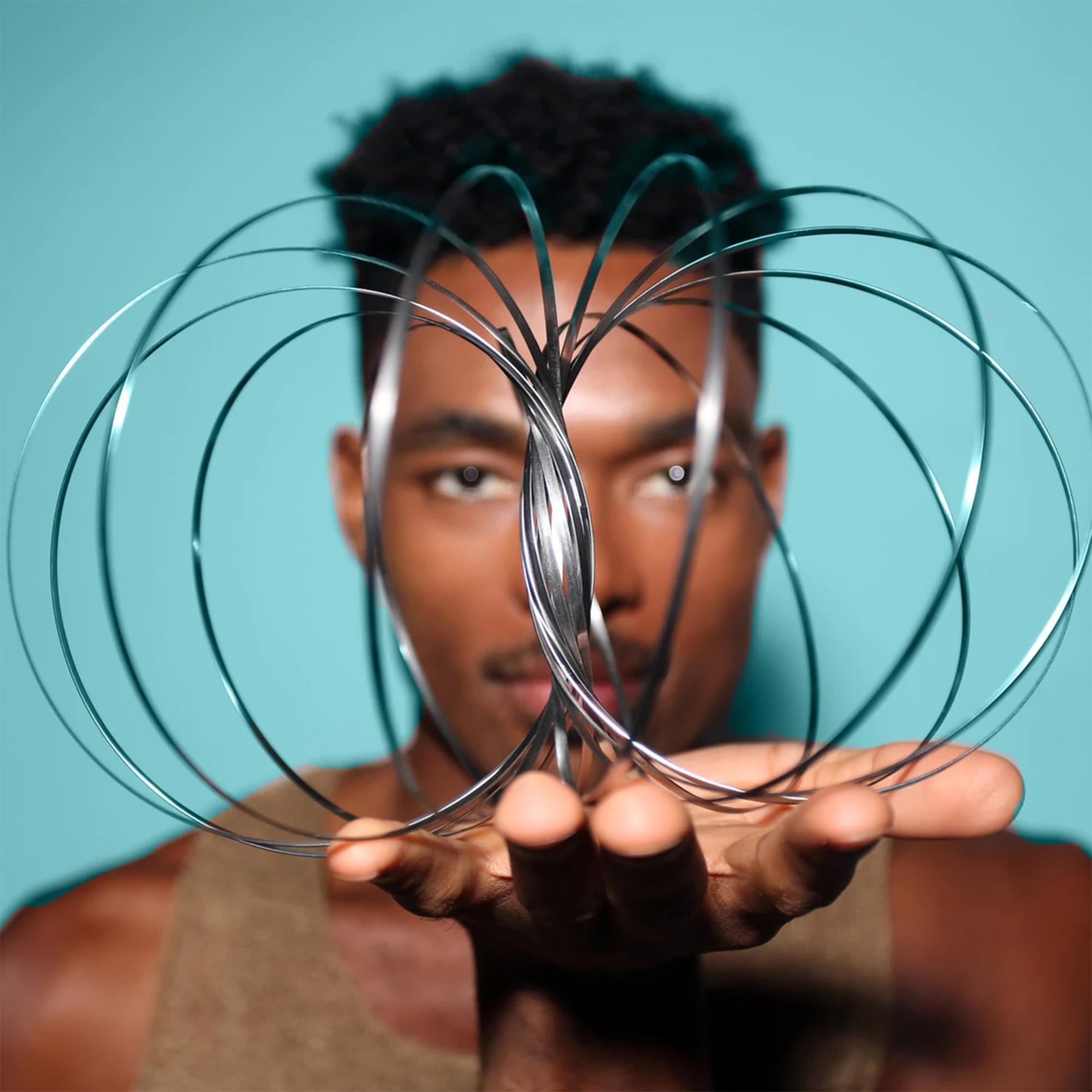 Alt View 2. Flowtoys - ToroFlux Interactive Kinetic Sculpture Metal Spring Flow Toy - Black.