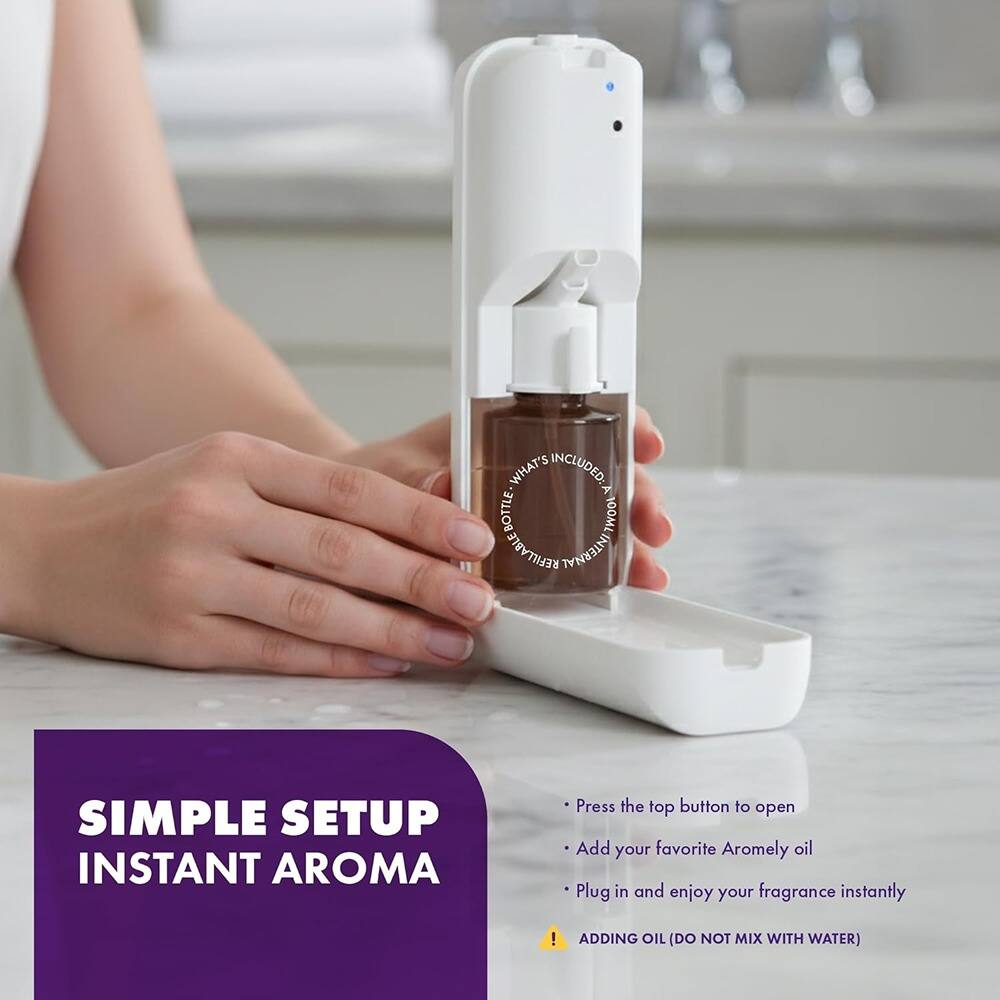 5 INCLUDED: WHAT'S INCLUDED: BOTTLE 100ML REFILLABLE BOTTLE INTERNAL SIMPLE SETUP INSTANT AROMA

Press the top button to open
Add your favorite Aromely oil
Plug in and enjoy your fragrance instantly!

ADDING OIL (DO NOT MIX WITH WATER)