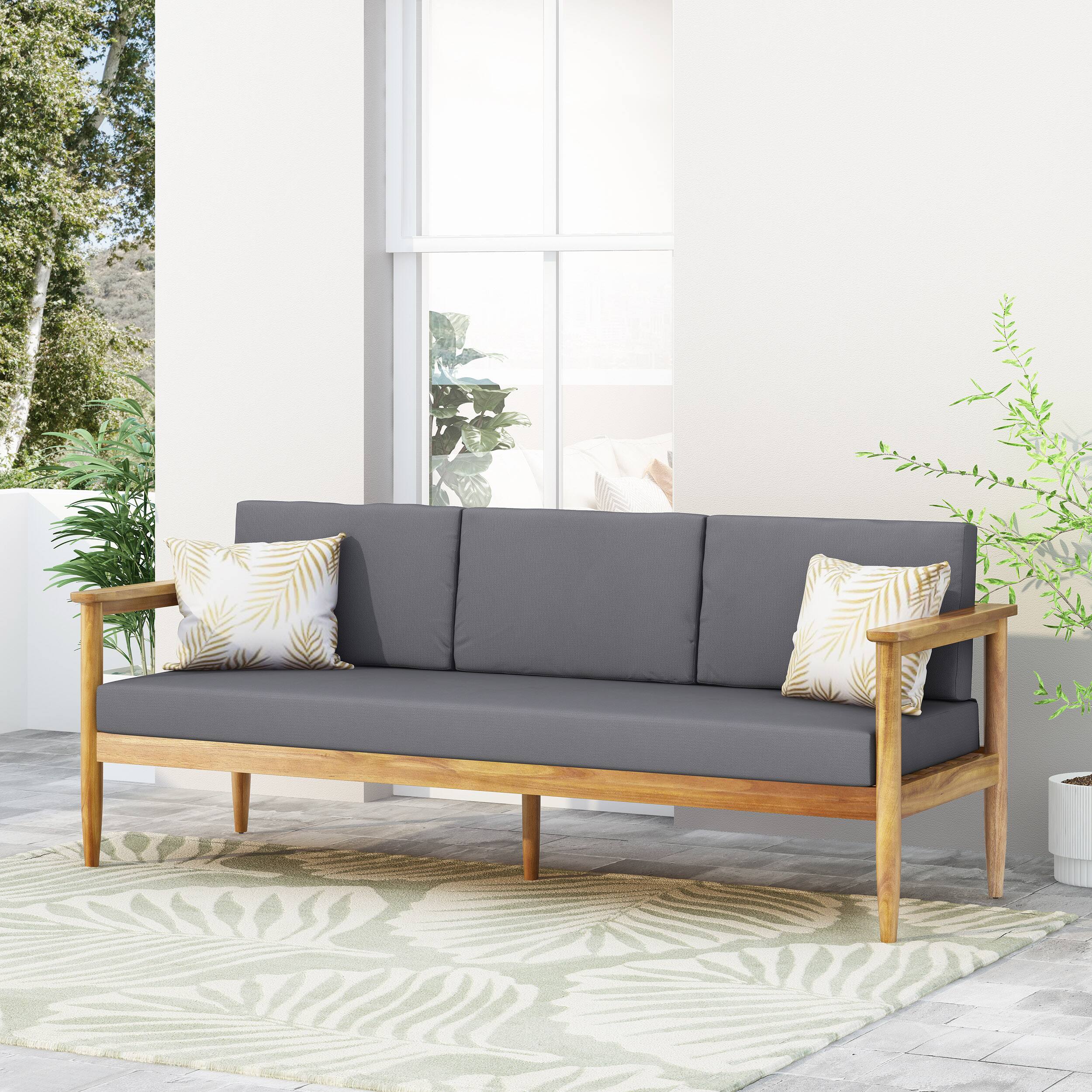 Angle. Mondawe - Acacia Wood Outdoor Sofa with Water-Resistant Cushions - Dark Grey.