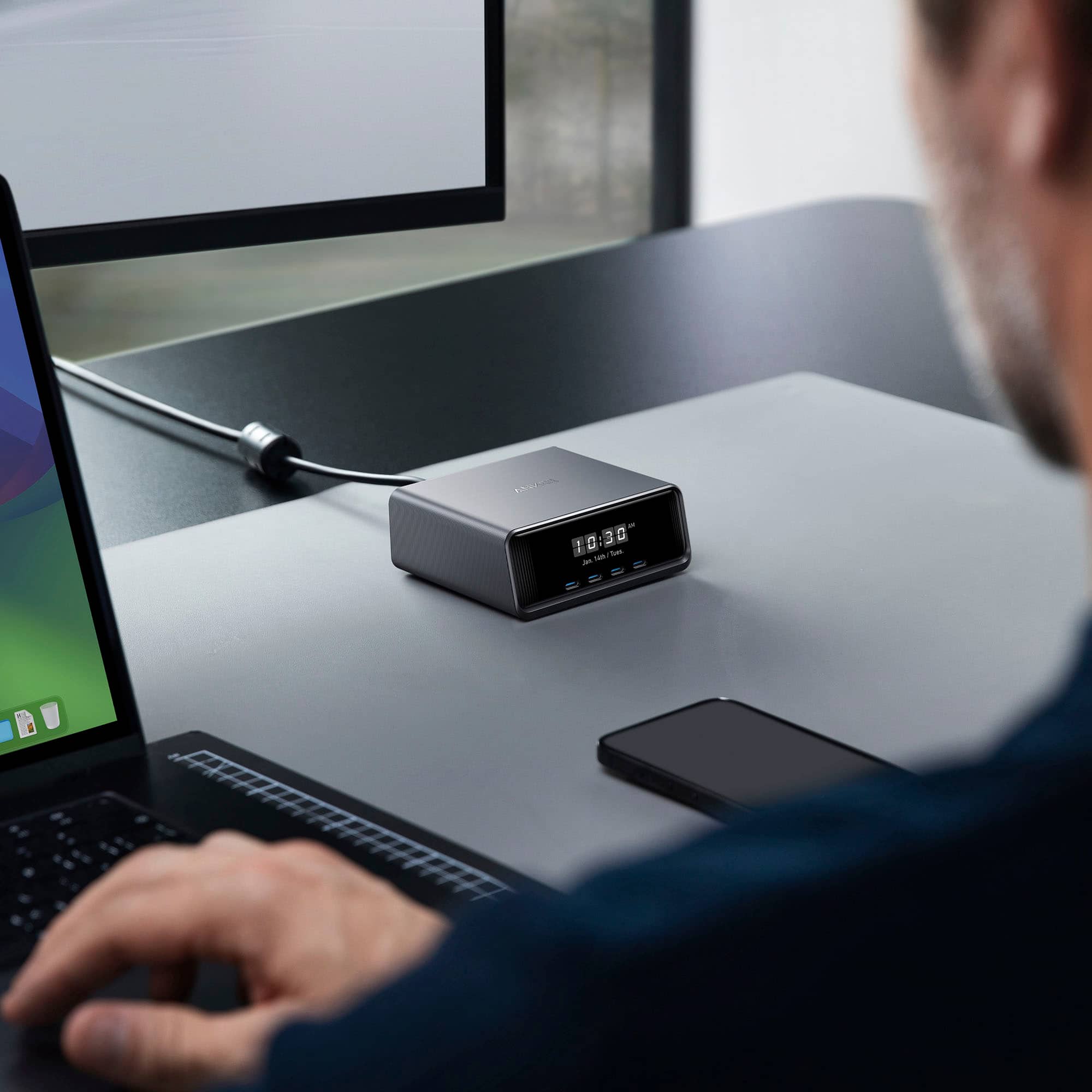 The text on the image reads "10:30 3 C 1 C /20 - - - RO." This text is likely related to the clock on the desk, which is displaying the time as 10:30. The text might be indicating the current temperature, humidity, or other environmental conditions in the room.