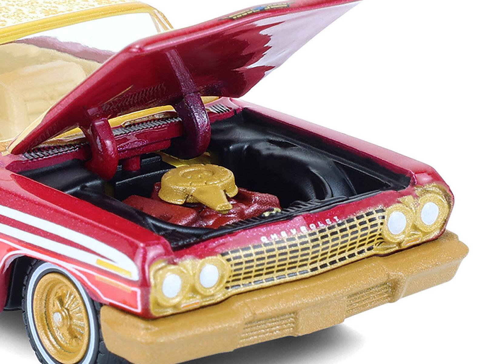 Alt View 1. Greenlight - 1963 Chevrolet Impala Lowrider Red Metallic with Cream Top and Interior with Gold Graphics 1/64 Model Car by Greenlight.