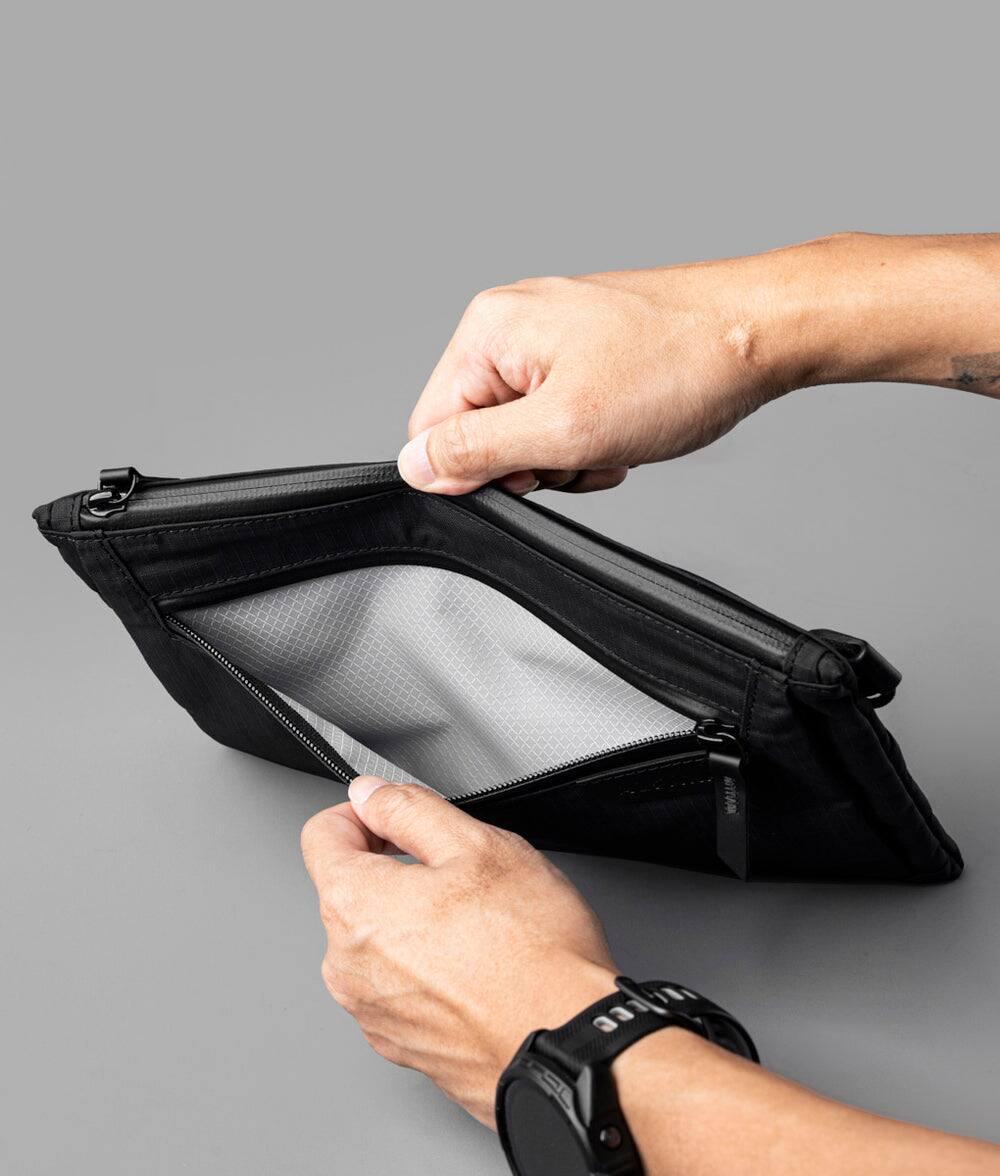 Alt View 6. ALPAKA - 2L Crossbody Tech Organizer Bag for iPad Mini, Zip Pouch Max V2 Travel Sling Bag with Expandable Storage - Black Axoflux 210D.