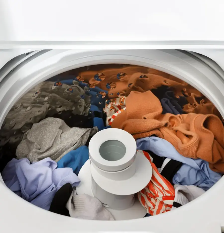 Alt View 15. GE - 4.5 Cu. Ft. High-Efficiency Top Load Washer with Spanish Control Panel - White with Matte Black.