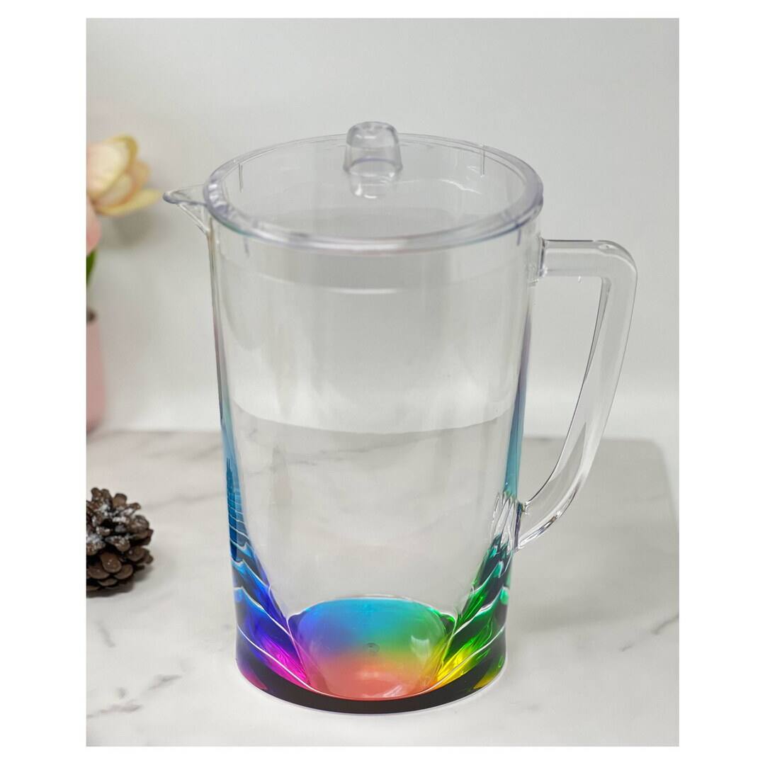 Left. APRILSOUL - Quarts Water Pitcher with Lid Oval Halo Design Unbreakable Plastic BPA Free Juice Pitcher - white.