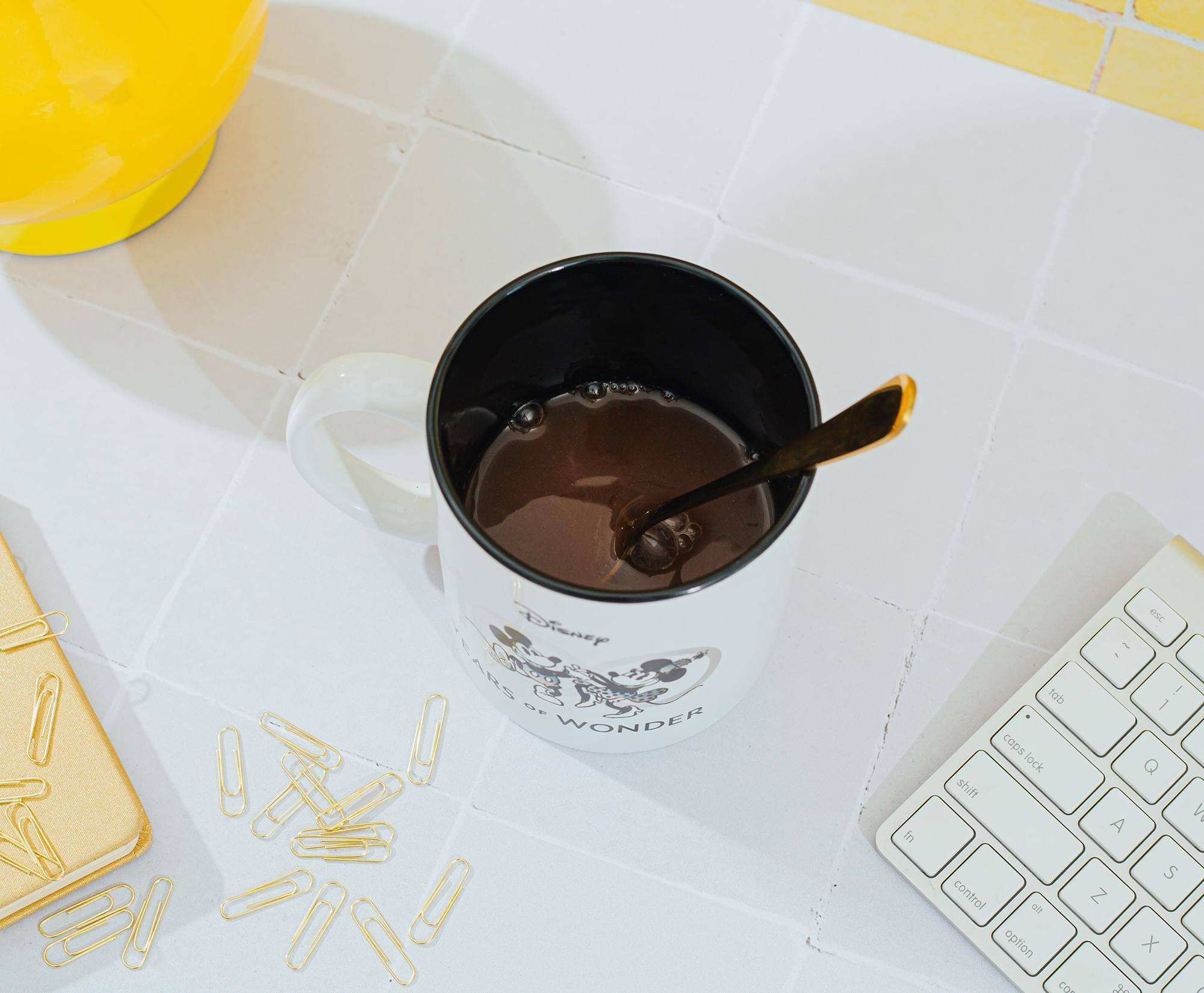 Disney EARS C E WONDER  
In shift tob caps lock esc - ! 1 Q A control cit option S Z X CO ..8. &