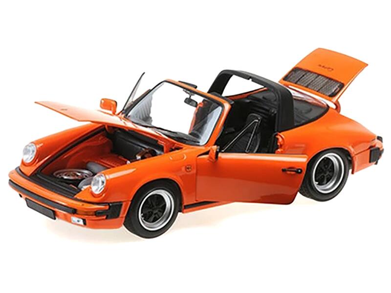 Angle. Minichamps - 1983 Porsche 911 Carrera Targa 3.2 Orange 1/18 Diecast Model Car by Minichamps - Orange.