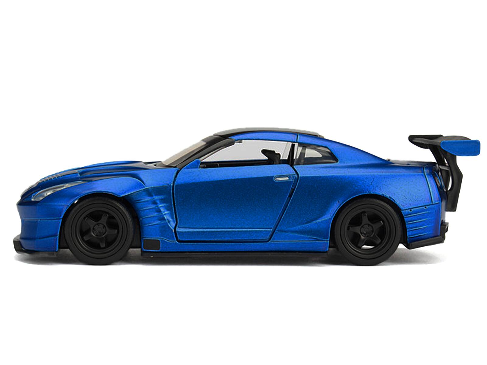 Left. Jada - Brian's 2009 Nissan GTR R35 Blue Ben Sopra "Fast & Furious" Movie 1/32 Diecast Model Car  by Jada - Blue.