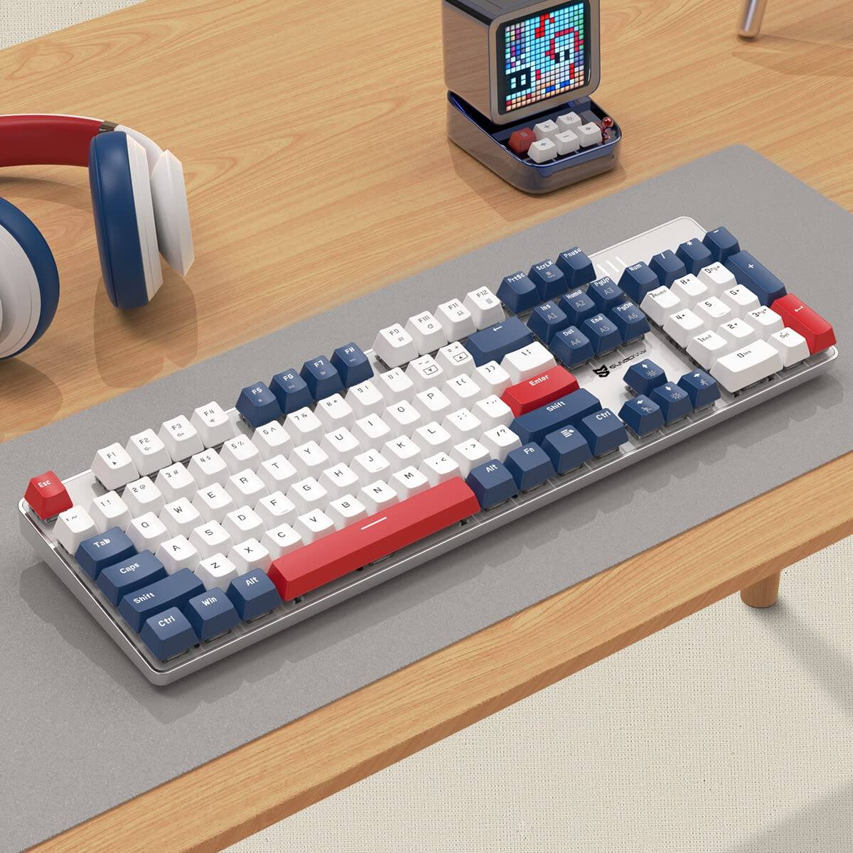 Sure, here is the corrected and grouped text from the image:

**Top Row:**
- F1 F2 F3 F4 F5 F6 F7 F8 F9 F10 F11 F12

**Second Row:**
- Q W E R T Y U I O P

**Third Row:**
- A S D F G H J K L ; '

**Fourth Row:**
- Z X C V B N M , . /

**Left Side:**
- Tab Caps Shift Ctrl

**Right Side:**
- Alt Win

**Number Row:**
- 1 2 3 4 5 6 7 8 9 0 - + Enter

**Function Keys:**
- Esc

**Special Keys:**
- Space

**Additional Keys:**
- Fn

**Other Keys:**
- PrSc SysRq Pause

**Numeric Keypad:**
- 7 8 9 / 4 5 6 * 1 2 3 - 0 . Enter

**Top Right Corner:**
- Insert Home Page End

**Top Left Corner:**
- Delete Backspace

**Top Center:**
- F11 F12

**Bottom Row