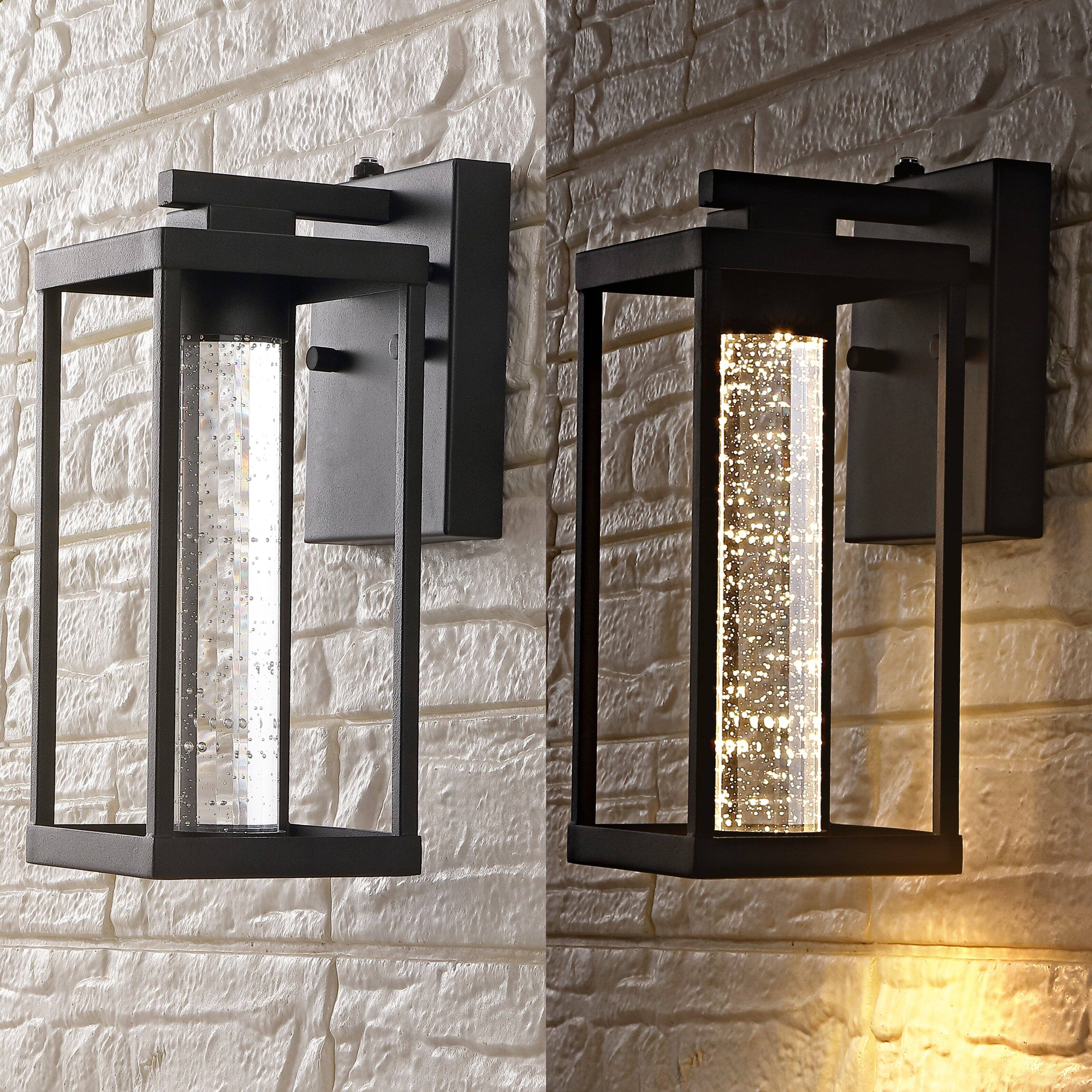 Alt View 4. Jonathan Y - Juno 4.75" 1-Light Industrial Vintage Iron/Seeded Glass with Dusk-to-Dawn Sensor Integrated LED Outdoor Sconce, Black - Black.