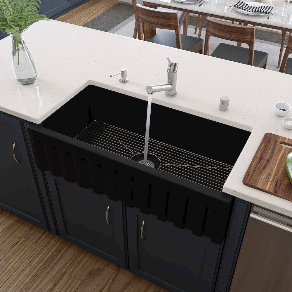 Left. Alfi - 36" Black Matte Reversible Smooth / Fluted Single Bowl Fireclay Farm Sink - Black.