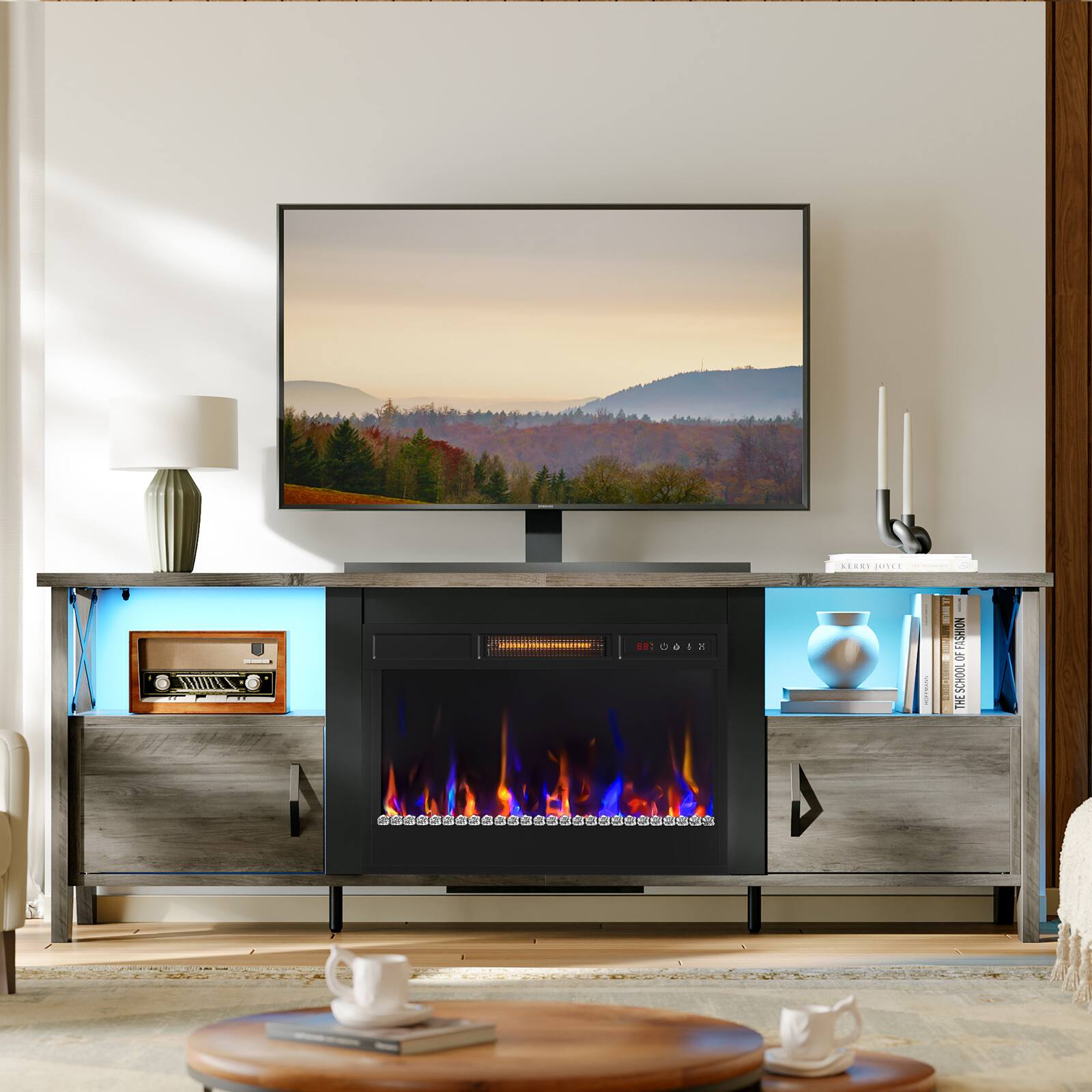 I cannot group or correct the text as it does not seem to be related to the image. The image features a flat screen TV on a stand, a fireplace, and a coffee table with cups and books on it.