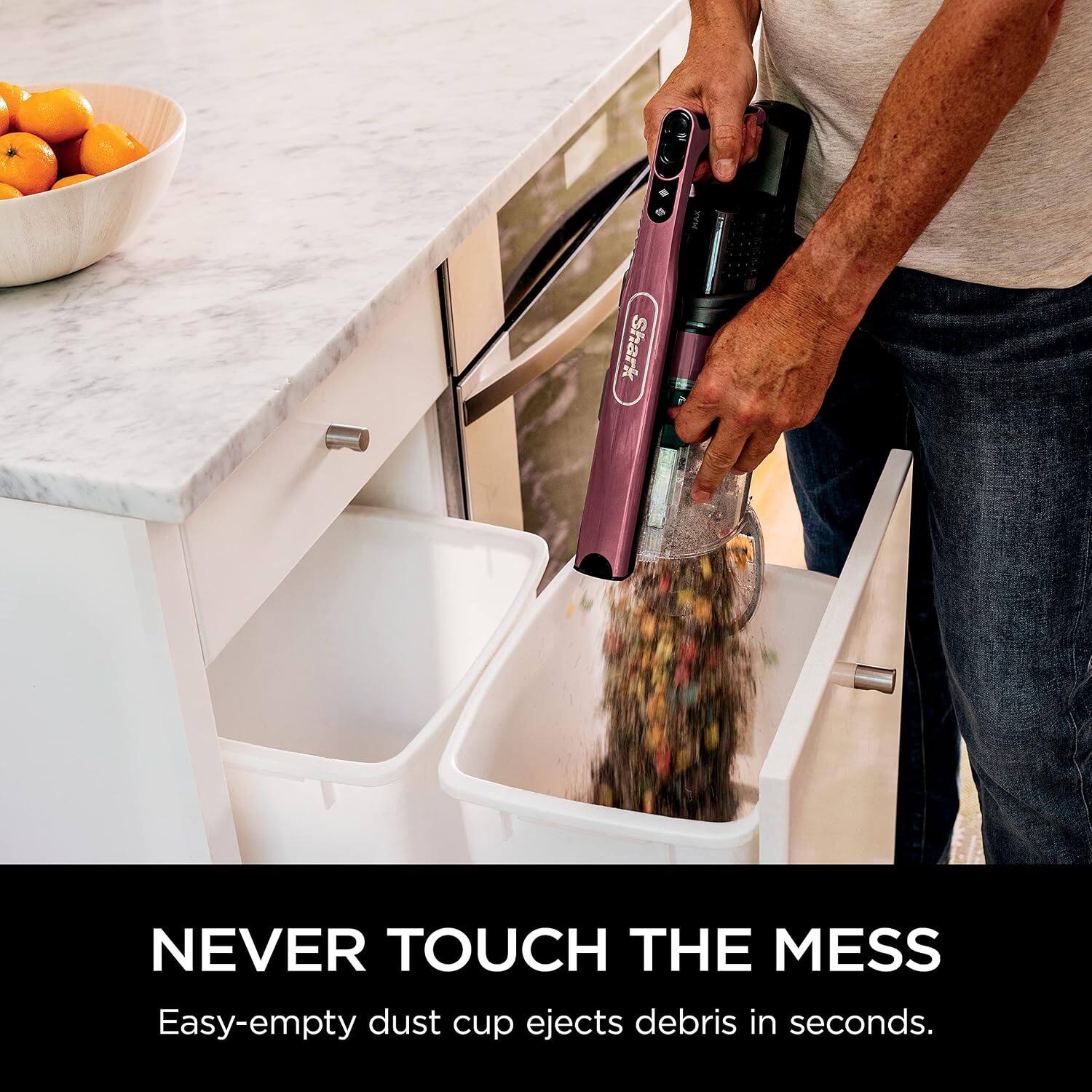 Shark  
NEVER TOUCH THE MESS  
Easy-empty dust cup ejects debris in seconds.
