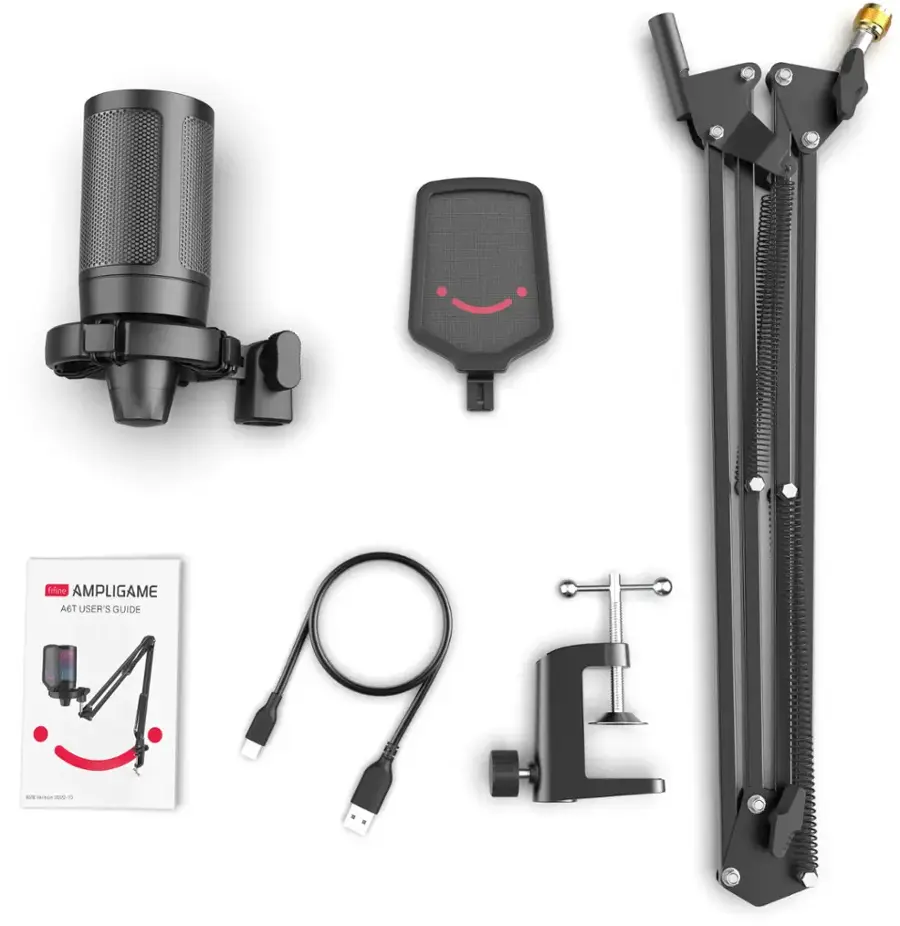 The image features a collection of items, including a microphone, a book, a charger, and a black object. The items are arranged in a way that showcases their various functions and purposes. The microphone is likely used for amplifying sound, while the book may provide information or instructions related to the use of the microphone or other related equipment. The charger is used to recharge the battery of the microphone or other electronic devices, and the black object could be a stand or a mounting bracket for the microphone or other equipment. The arrangement of these items suggests that they are part of a gaming setup or a recording studio.