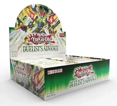 The text on the image reads: "YEARS SHOW MY YU-GI-OH! Yu-Gi-Oh! TRADING CARD GAME DUELIST'S ADVANCE 9 CARDS PER PACK 24 PACKS PER BOX UGOA 1ZIS7S ADECE KONAMI Yu-Gi-Oh! GAME CARDS TRADING DUELIST'S ADVANCE 9 CARDS PER PACK".