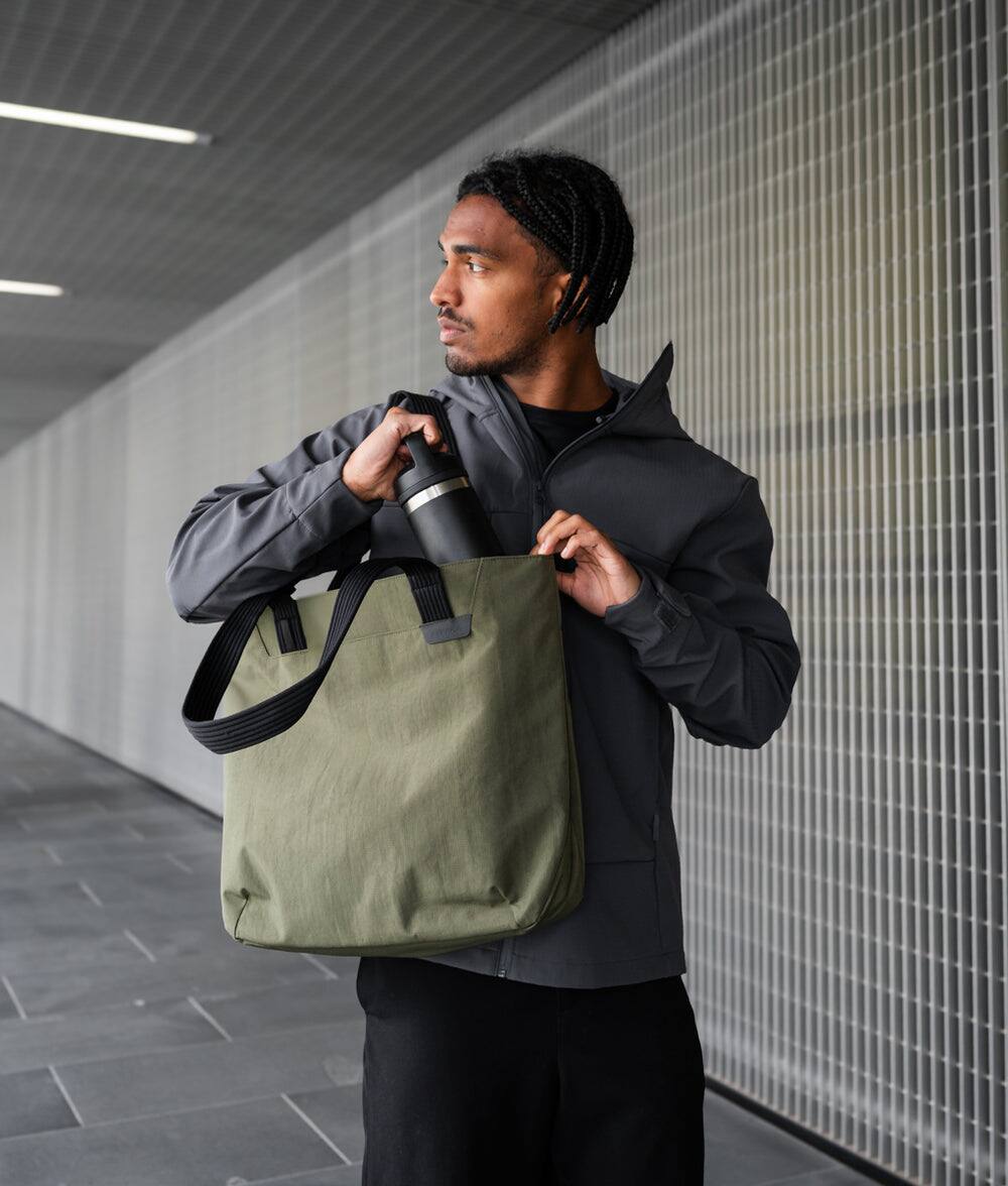 Alt View 9. ALPAKA - Flight Tote (M) Laptop Tote Bag for Work, Tote Bag Fits 14" MacBook Pro, Water Bottle Pocket, Luggage Pass-Through - Green Axoflux 400D.