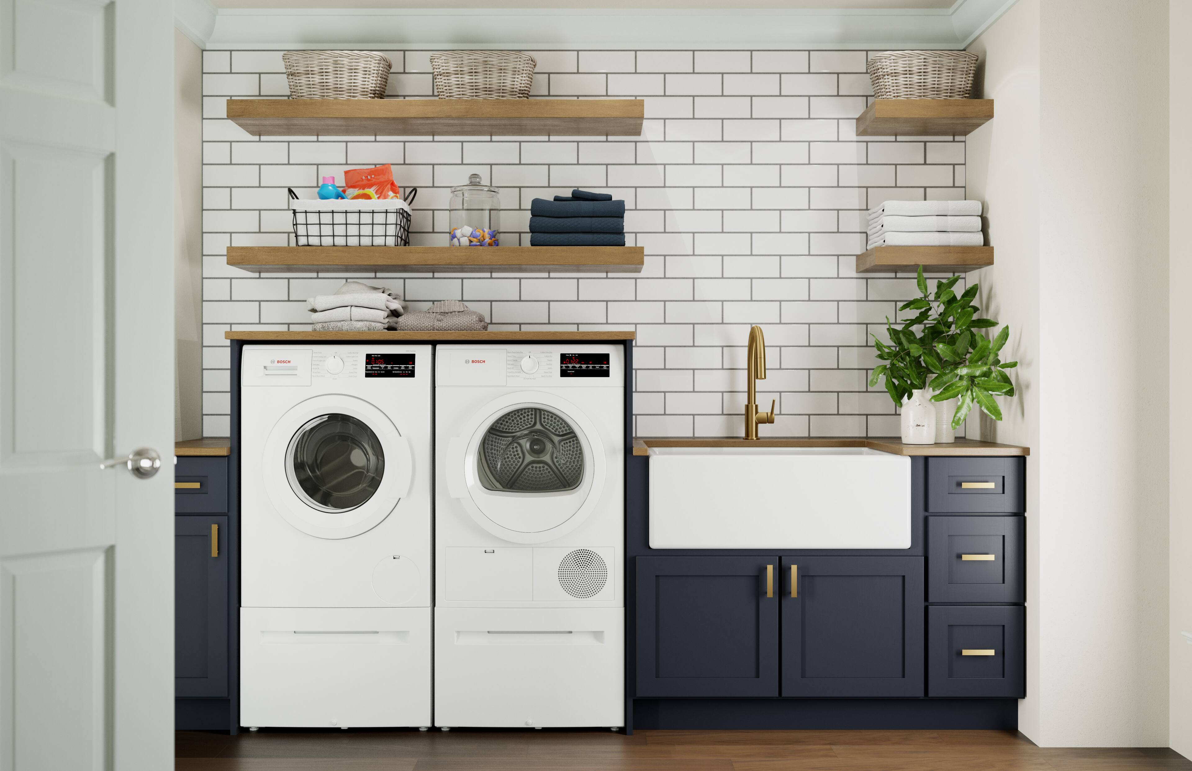 Front load washers are a great addition to any laundry room. They are designed to be more energy efficient and environmentally friendly compared to traditional top load washers. In the image, there are two front load washers placed side by side, which can be a space-saving solution in smaller laundry rooms. These washers are typically more compact and can be installed under a counter or in a corner, making them a practical choice for those with limited space.