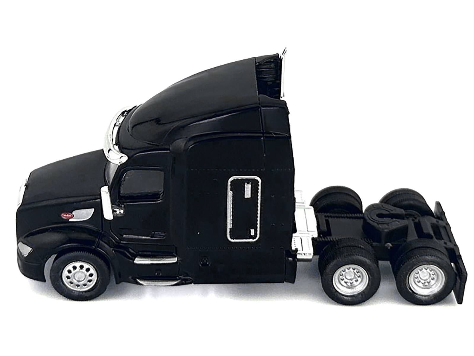 Left. HO Logistics Replicas - Peterbilt 579 Sleeper Cab Black 1/87 (HO) Plastic Model Car by HO Logistics - Black.