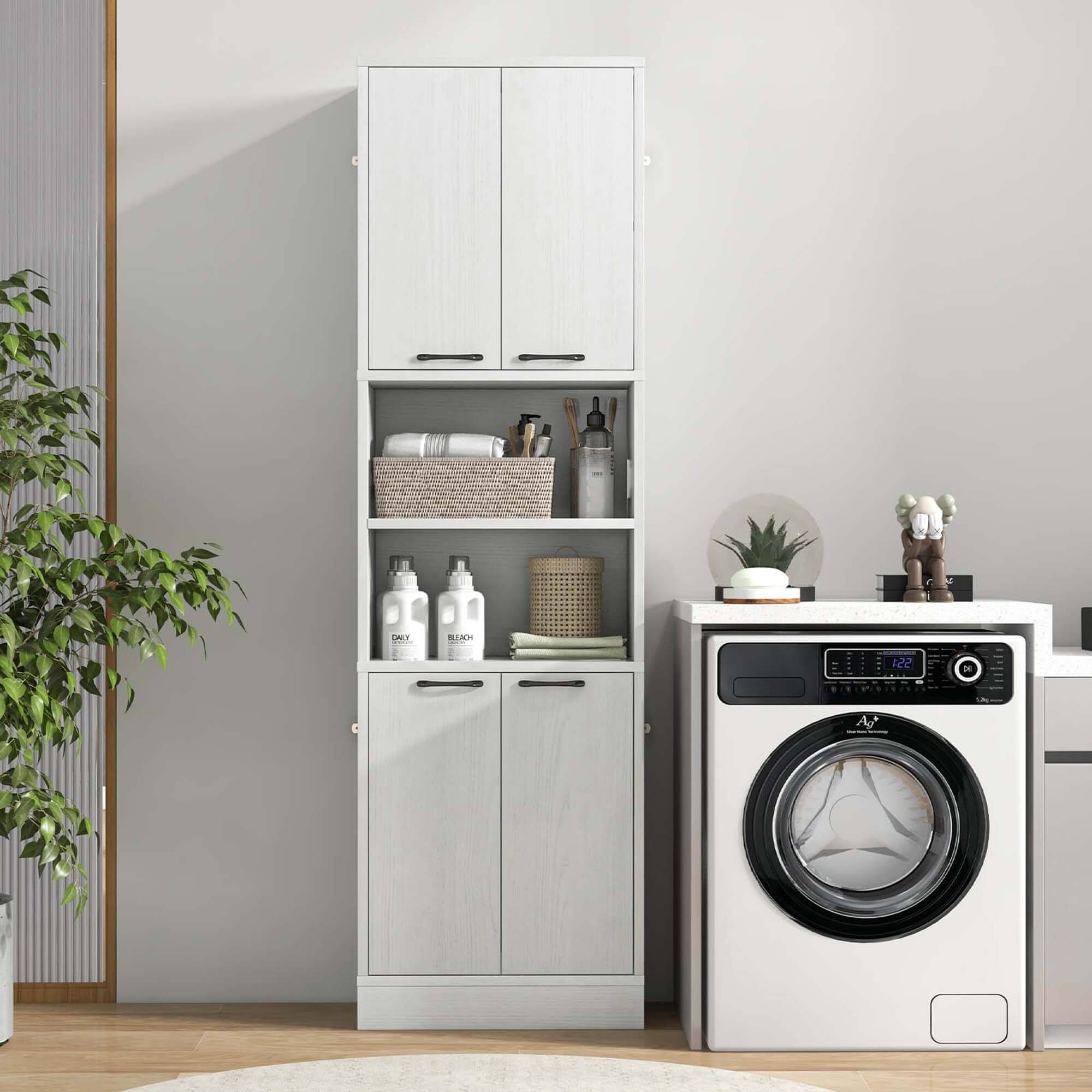 The image shows a laundry room with a washing machine and dryer. The washing machine is located on the right side of the room, while the dryer is on the left side. There is also a cabinet in the room, which has a shelf with a basket on it. Additionally, there are two potted plants in the room, one on the left side and another on the right side.