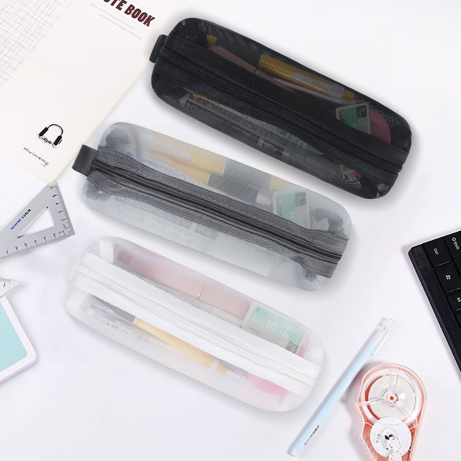 Sure, here is the corrected and grouped text from the image:

1. **Notebook:**
   - "NOTE BOOK"
   - "Huining"

2. **Pencil Cases:**
   - "Huining"

3. **Calculator:**
   - "Calc"
   - "0.00"

4. **Other Items:**
   - "Huining" (on the ruler)
   - "Huining" (on the pencil case)

The text is mostly brand names and labels for the items in the image.