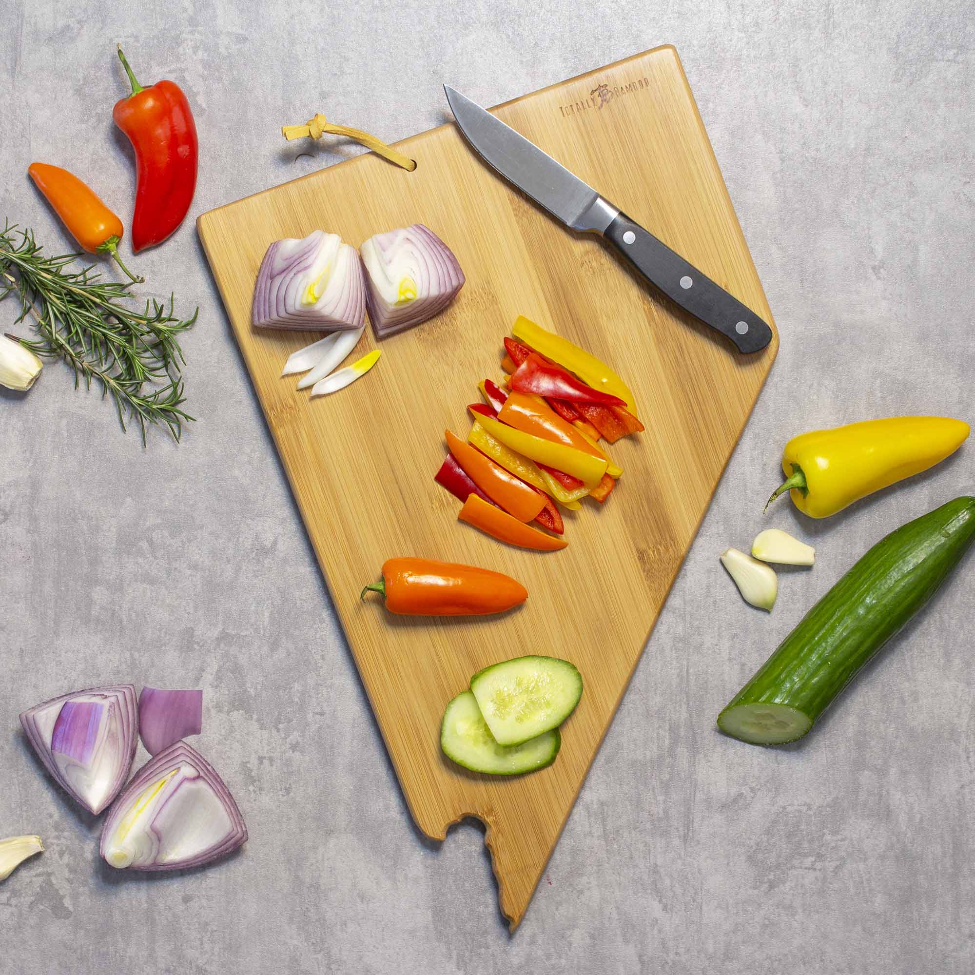 Left. Totally Bamboo - Nevada Cutting Board with Artwork by Summer Stokes.