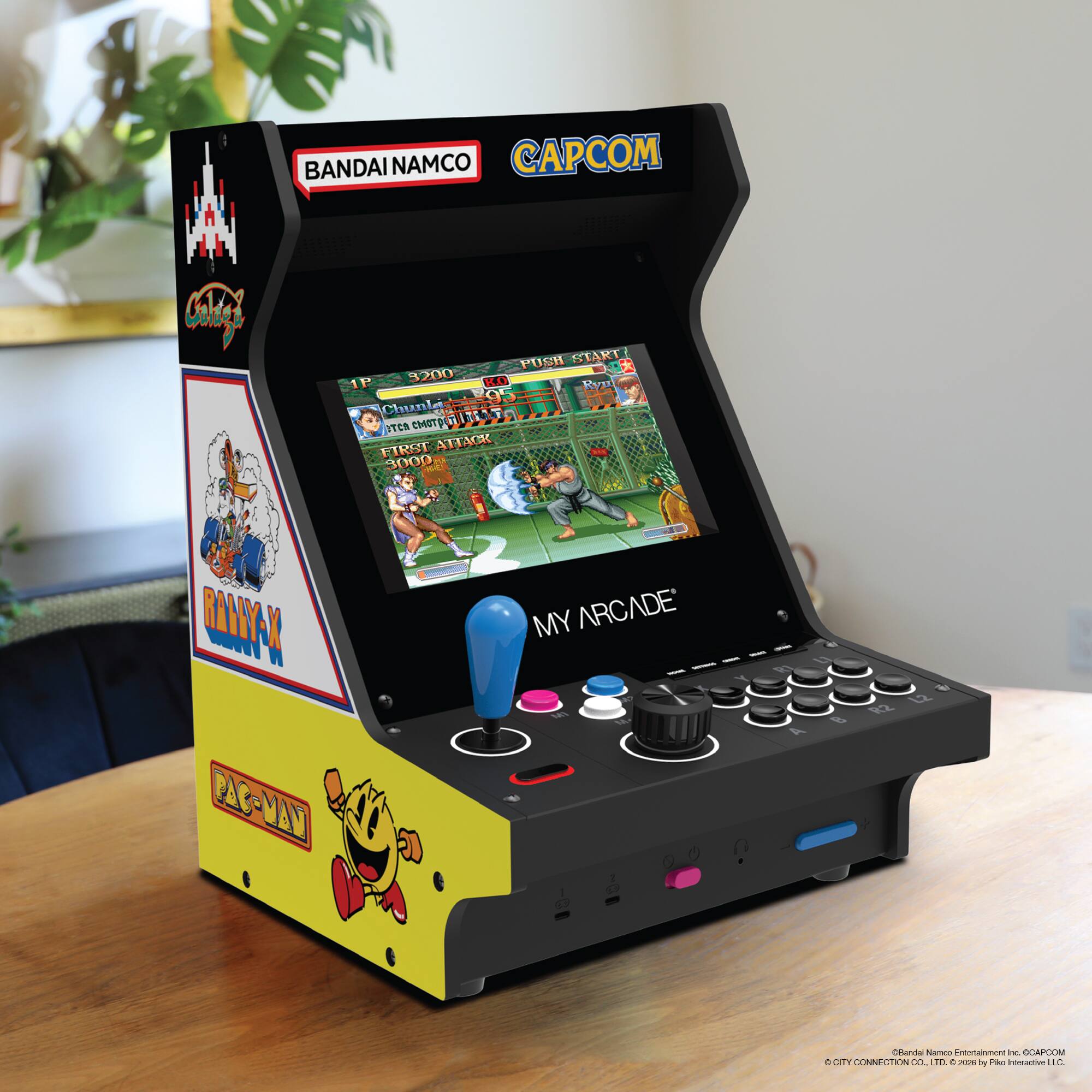 BANDAI NAMCO CAPCOM  
PUSH START  
3200  
1P Ryu  
9 JUC Chunk  
PON  
ITER  
EIRSE  
AITAC  
3000  
RAYSY-X  
PAC-MAN  
MY ARCADE  
8 92  
u2  
Uhandtal Namen  
aenae inE  
CAREN  
+ CATY  
CONNECTIN CO.  
0  
SOwr by PS Interactive LLC - E10+ (Everyone 10+)