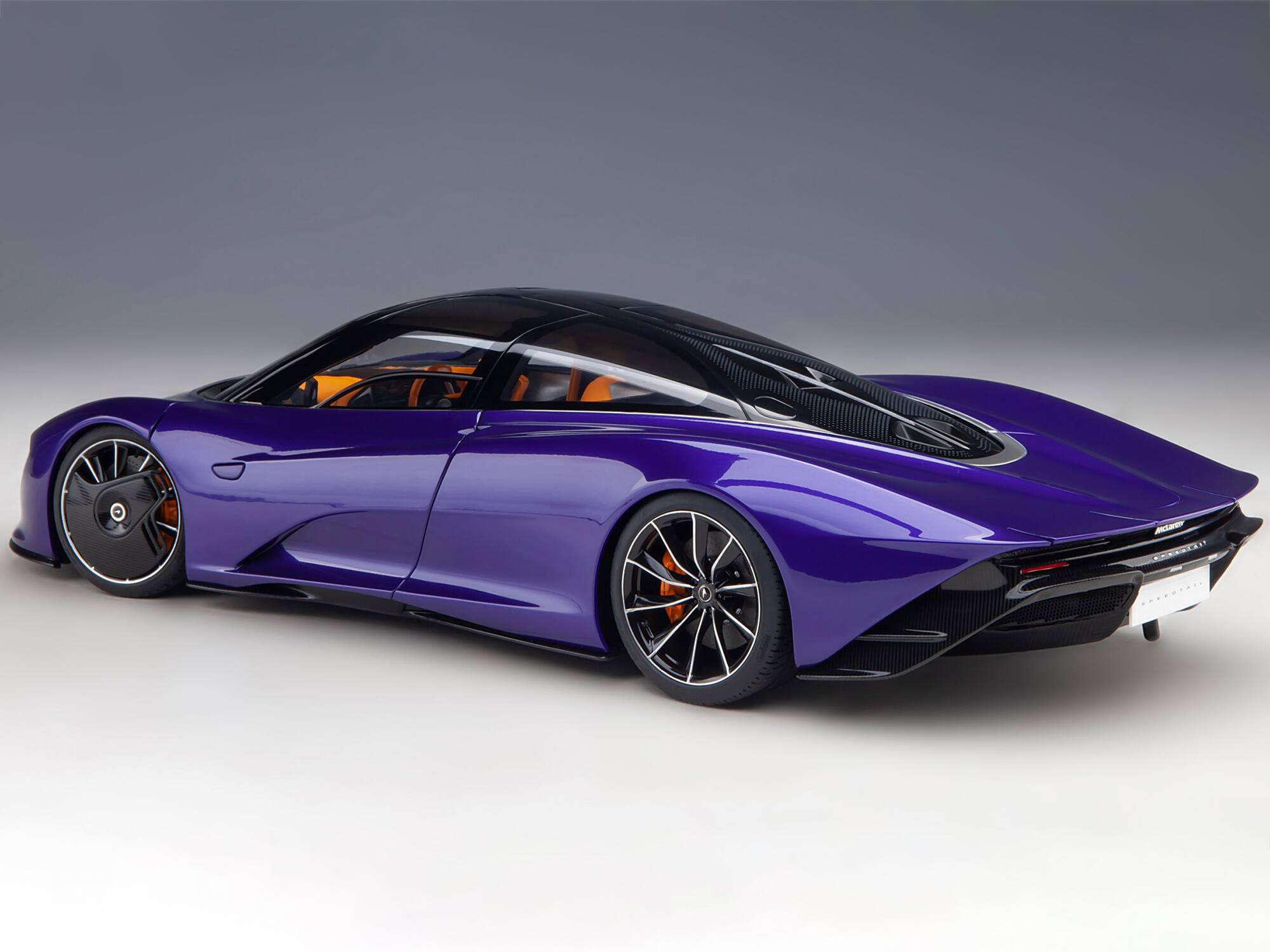 Alt View 7. Autoart - McLaren Speedtail Lantana Purple Met. w/Black Top and Yellow Interior and Suitcase Accessories 1/18 Model Car by Autoart.