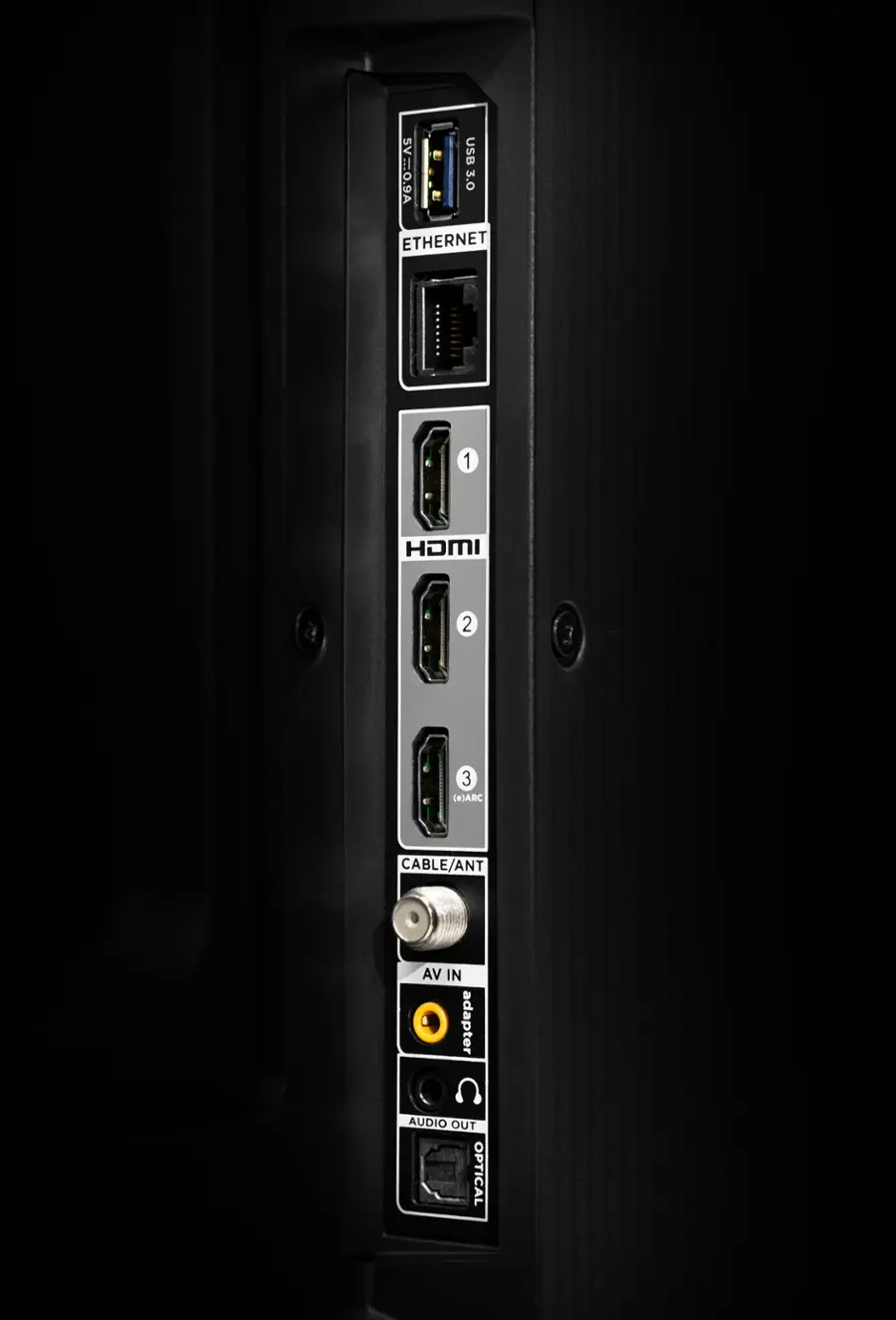 The image shows a black box with a row of ports on the front. The ports include a USB port, an Ethernet port, an HDMI port, and two additional ports. There is also a cable/antenna adapter and an audio out port. The box is described as a "server" in the image.