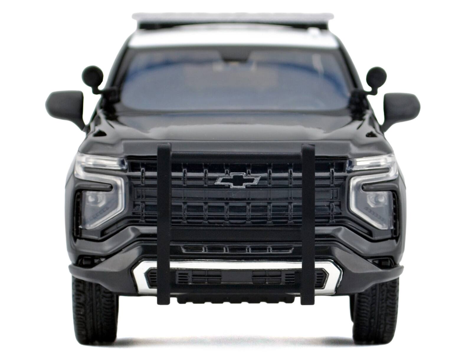 Alt View 2. Motormax - 2025 Chevrolet Tahoe Police Pursuit Vehicle "California Highway Patrol" Black and White 1/24 Model Car by Motormax.