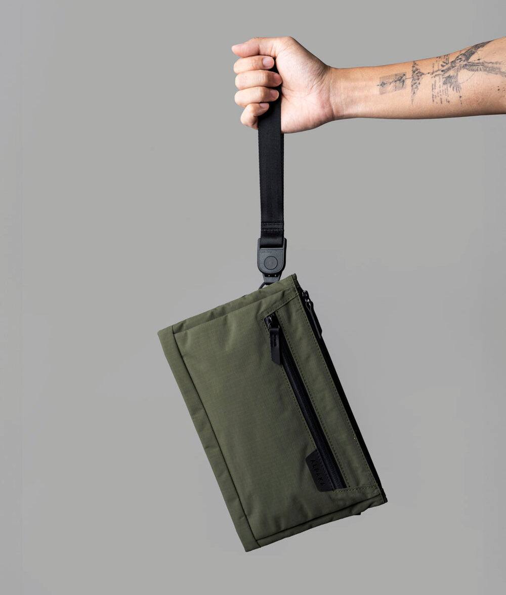 Alt View 1. ALPAKA - 2L Tech Organizer Sling Bag for iPad Mini, Zip Pouch Max V2 Crossbody Travel Bag with Expandable Storage - Green Axoflux 210D.